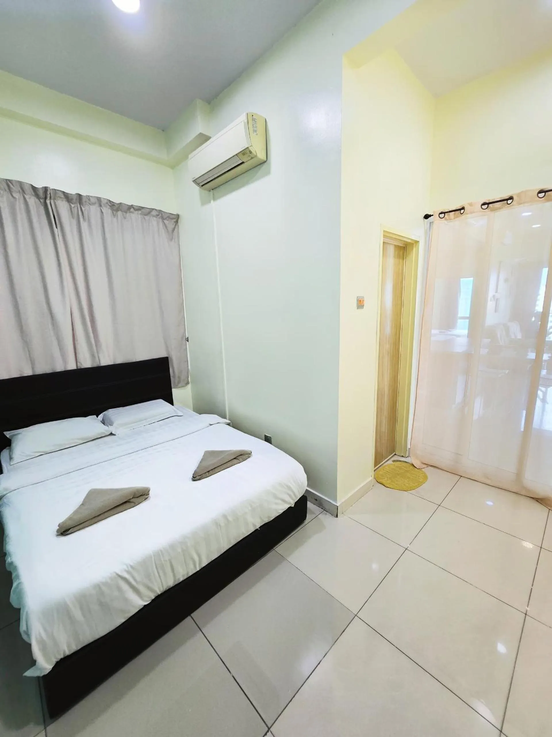 Bed in Mari Mari Homestay - IMAGO THE LOFT