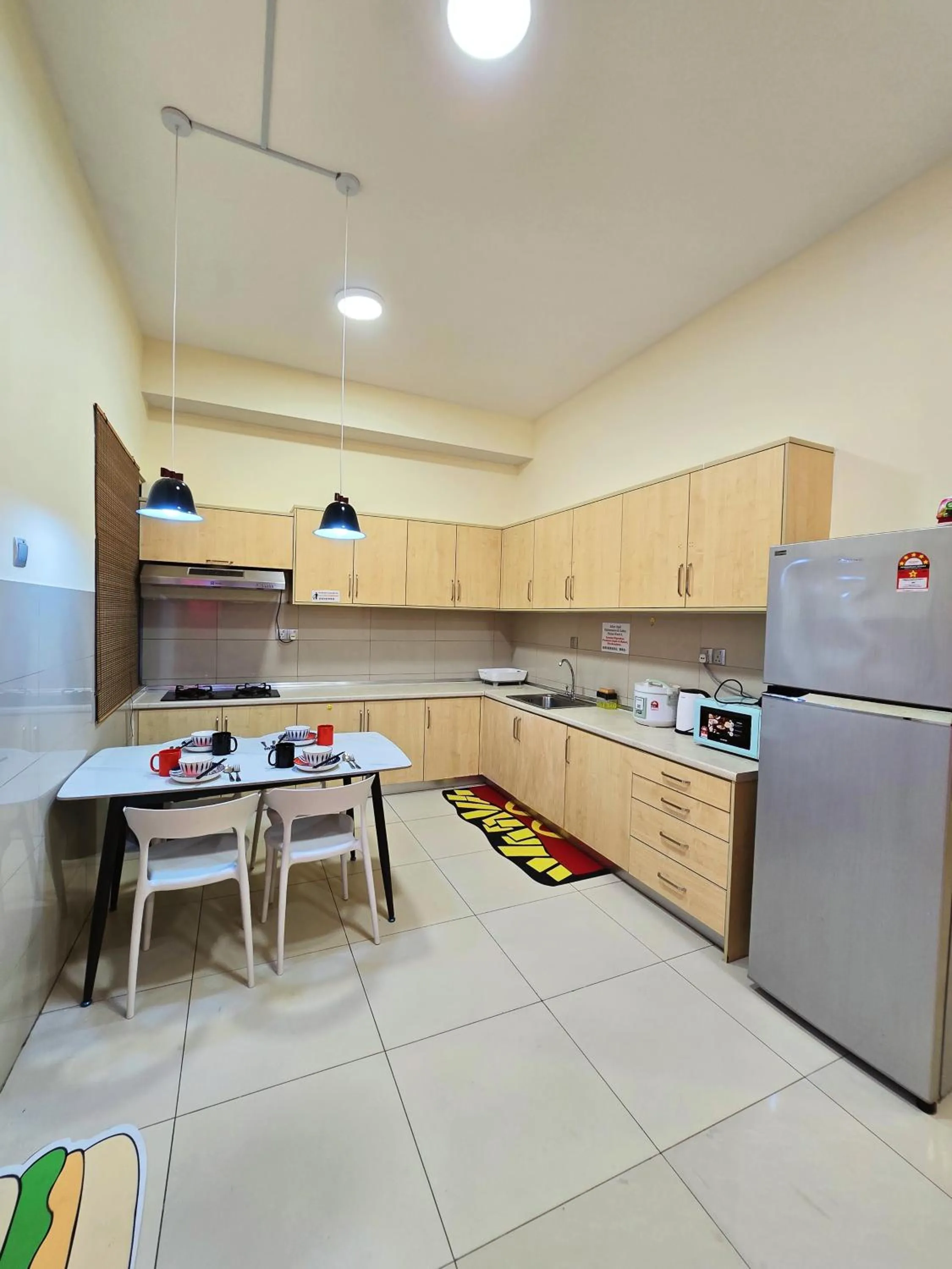 Kitchen or kitchenette in Mari Mari Homestay - IMAGO THE LOFT