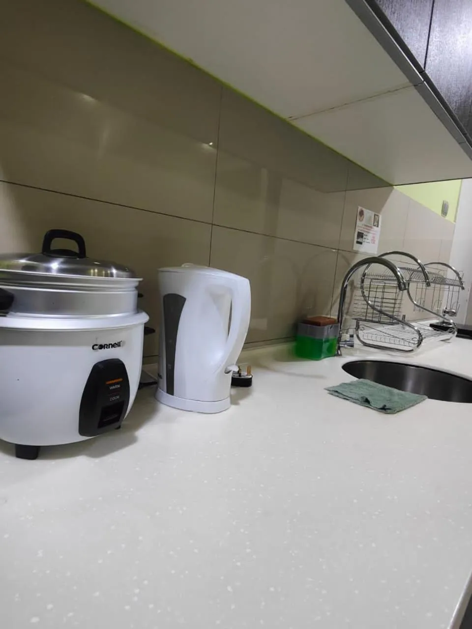 Kitchen or kitchenette in Mari Mari Homestay - IMAGO THE LOFT