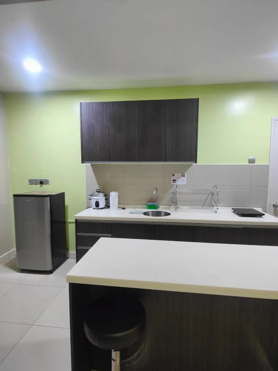 Kitchen or kitchenette in Mari Mari Homestay - IMAGO THE LOFT