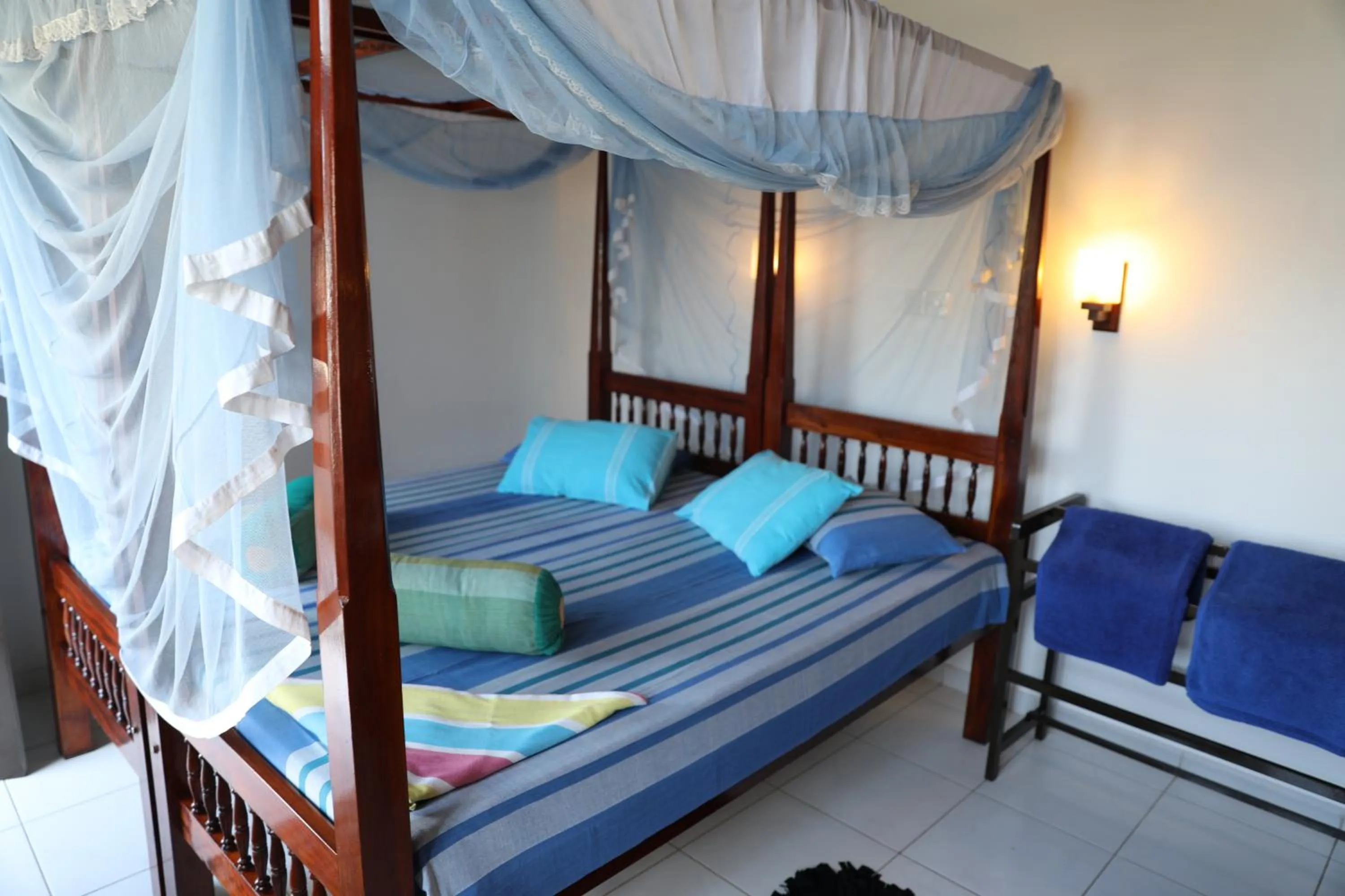 Bed in Main Reef Guest House