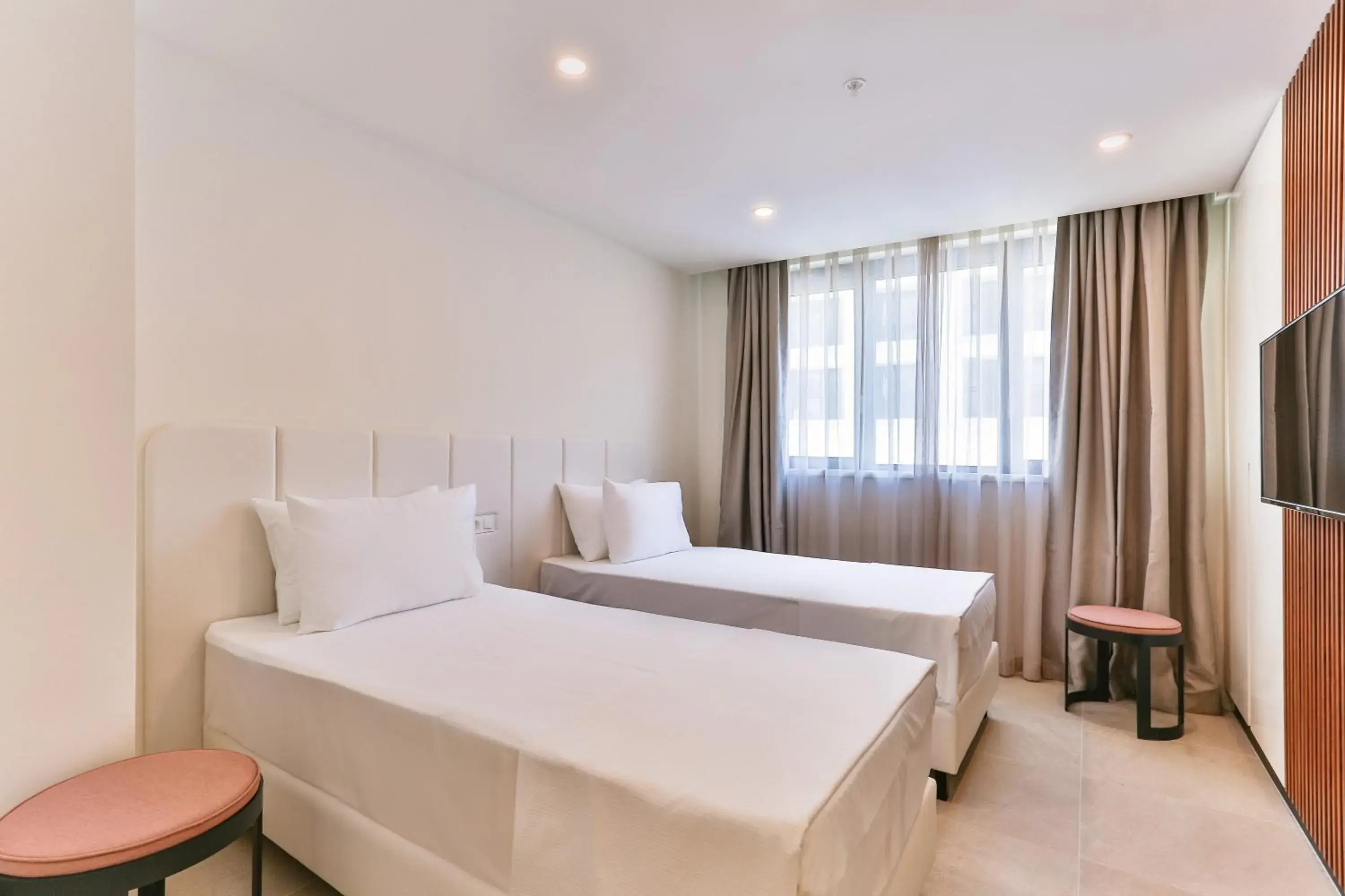 Bed in Sunraf Luxe Apartments Bed in Sunraf Luxe Apartments