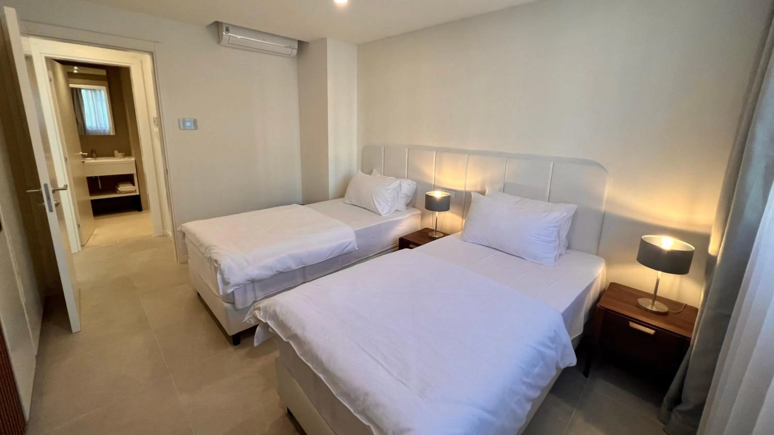 Bedroom, Bed in Sunraf Luxe Apartments