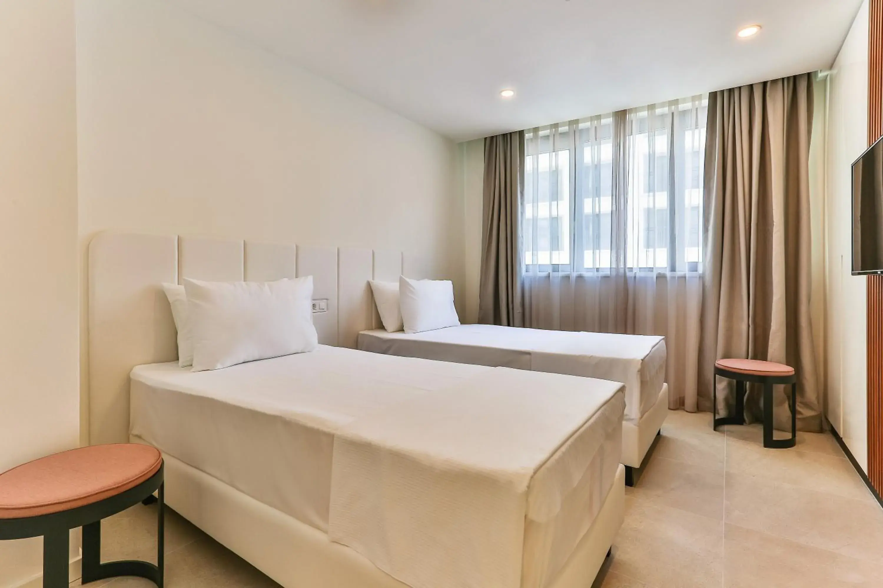 Bed in Sunraf Luxe Apartments Bed in Sunraf Luxe Apartments