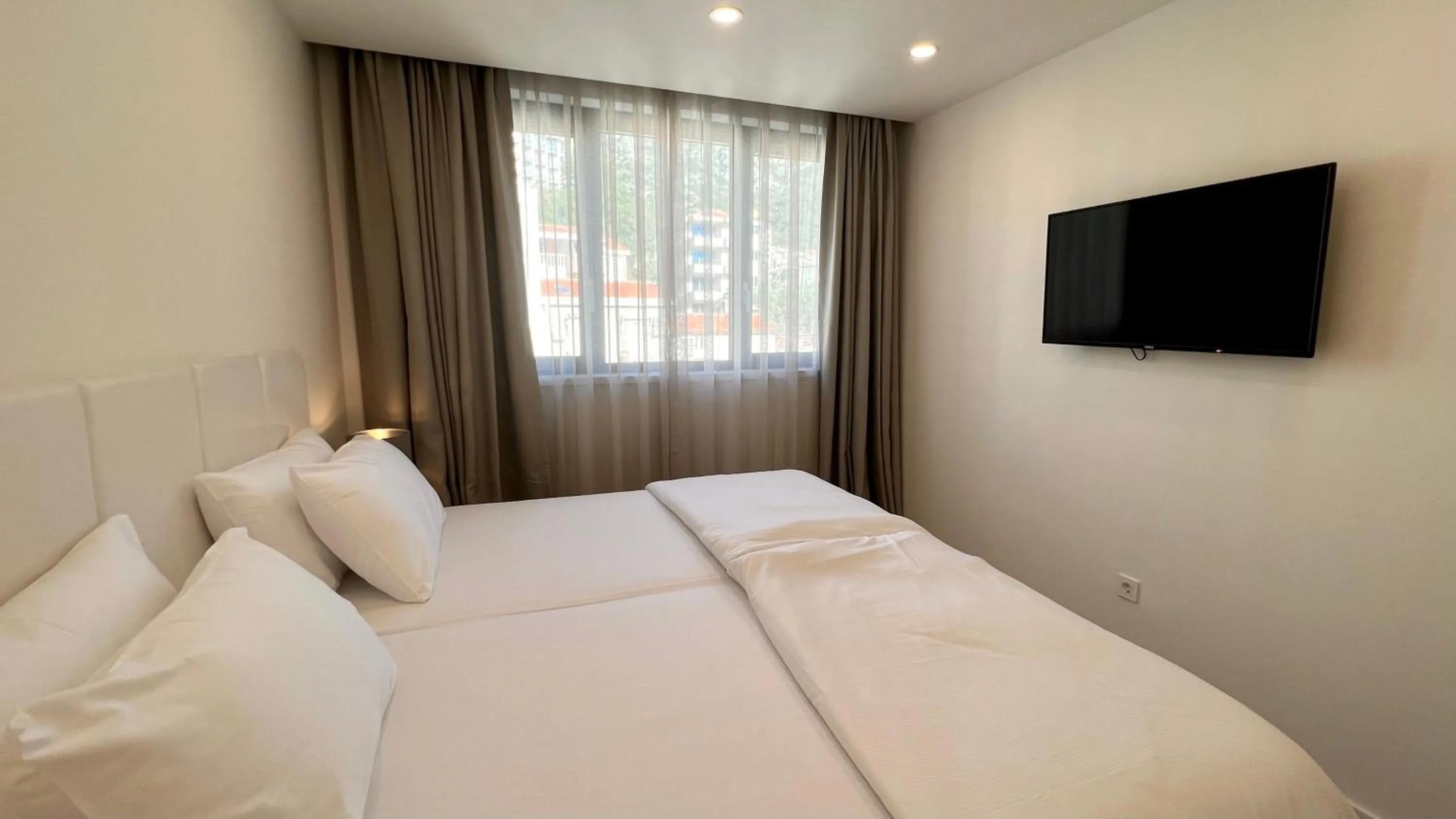 Bedroom, Bed in Sunraf Luxe Apartments