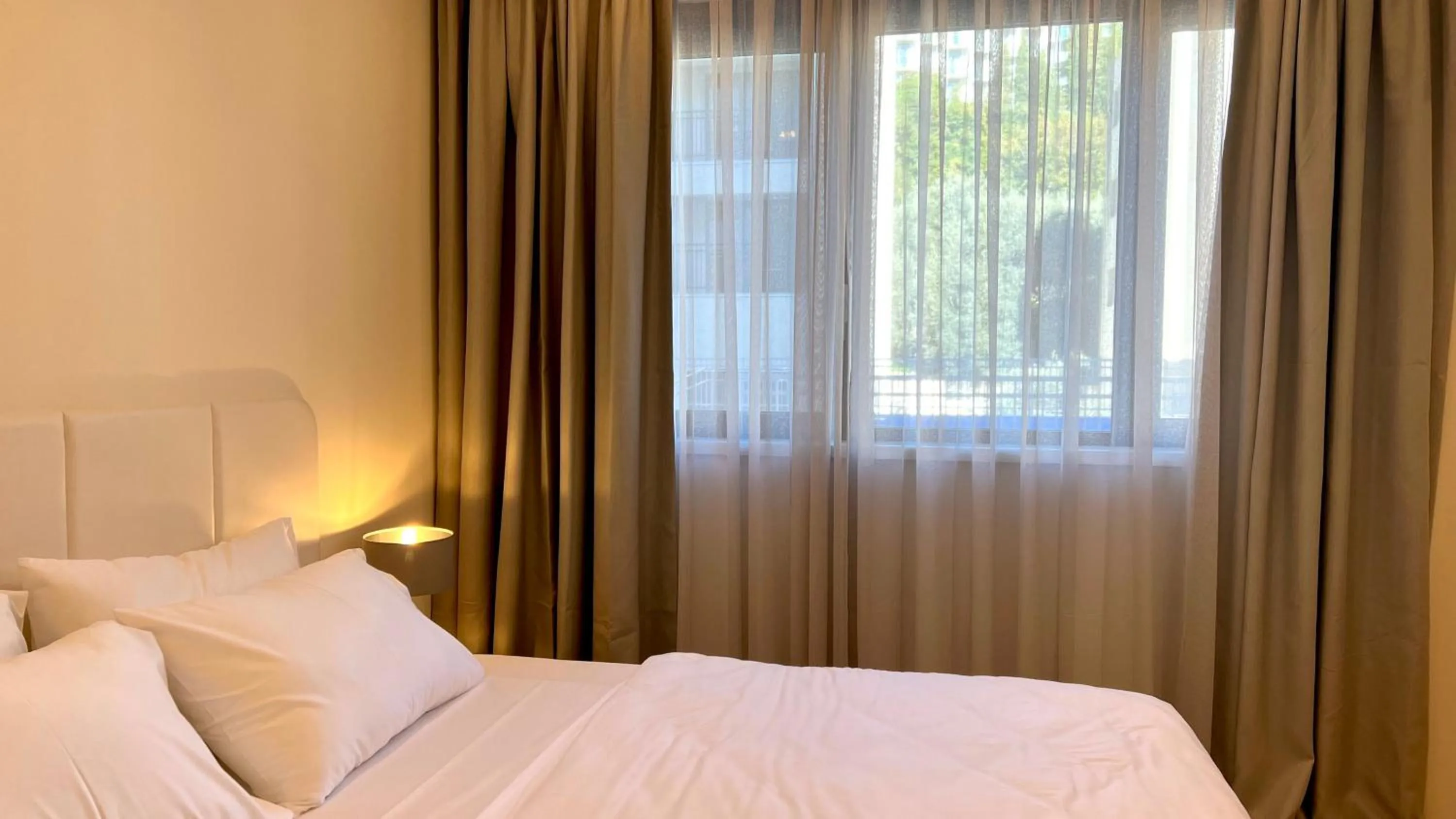 Bedroom, Bed in Sunraf Luxe Apartments