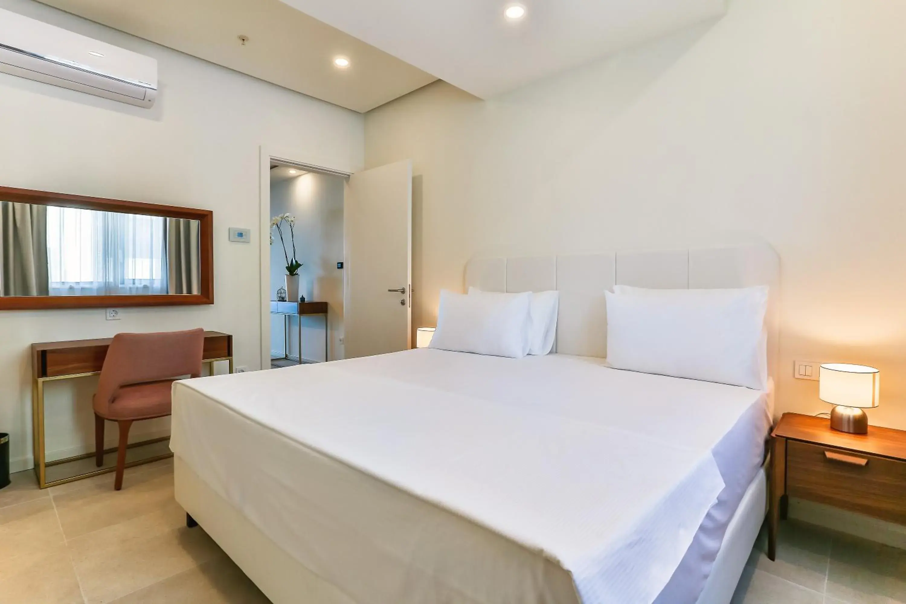 Bed in Sunraf Luxe Apartments Bed in Sunraf Luxe Apartments