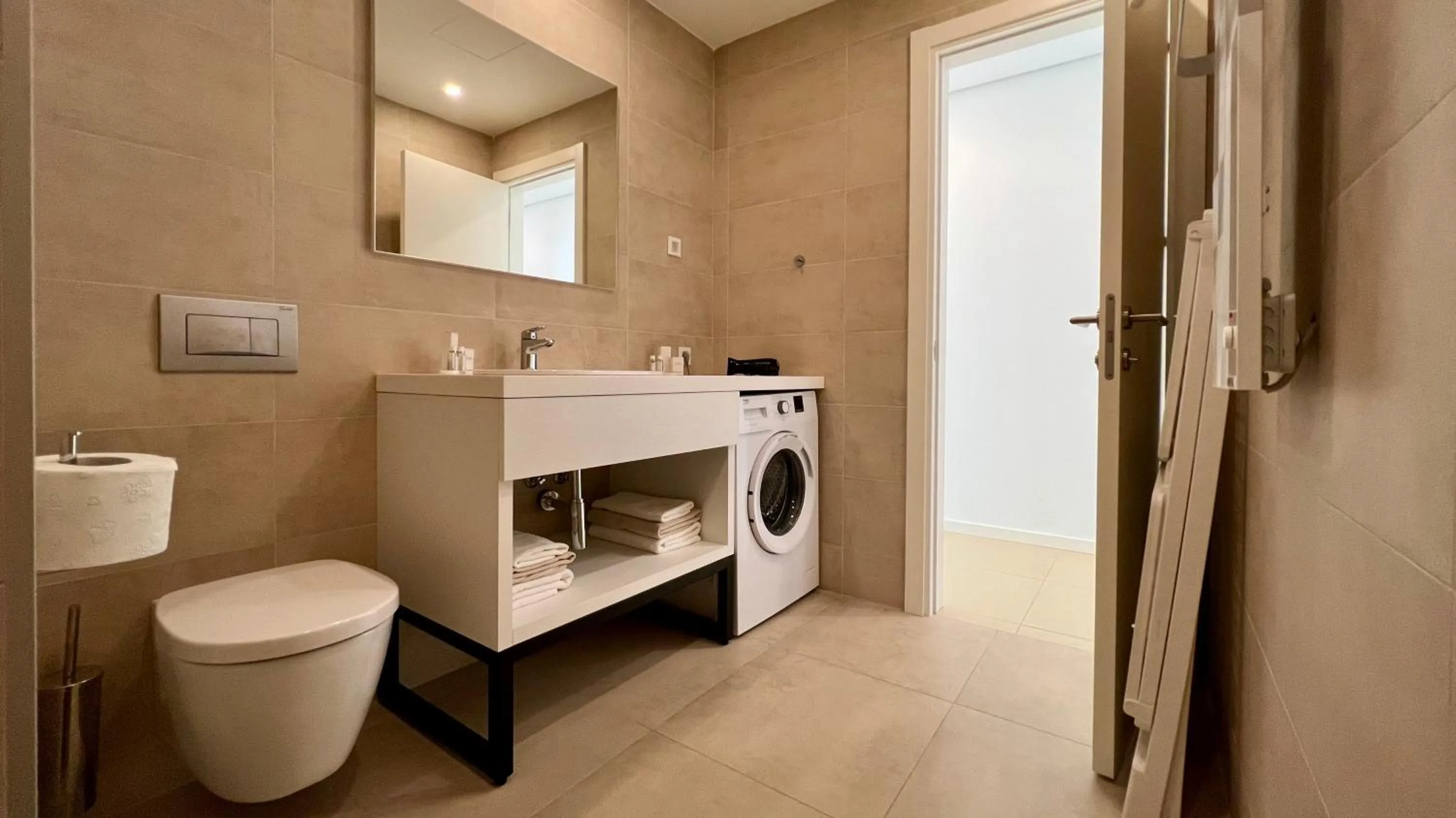 Toilet in Sunraf Luxe Apartments