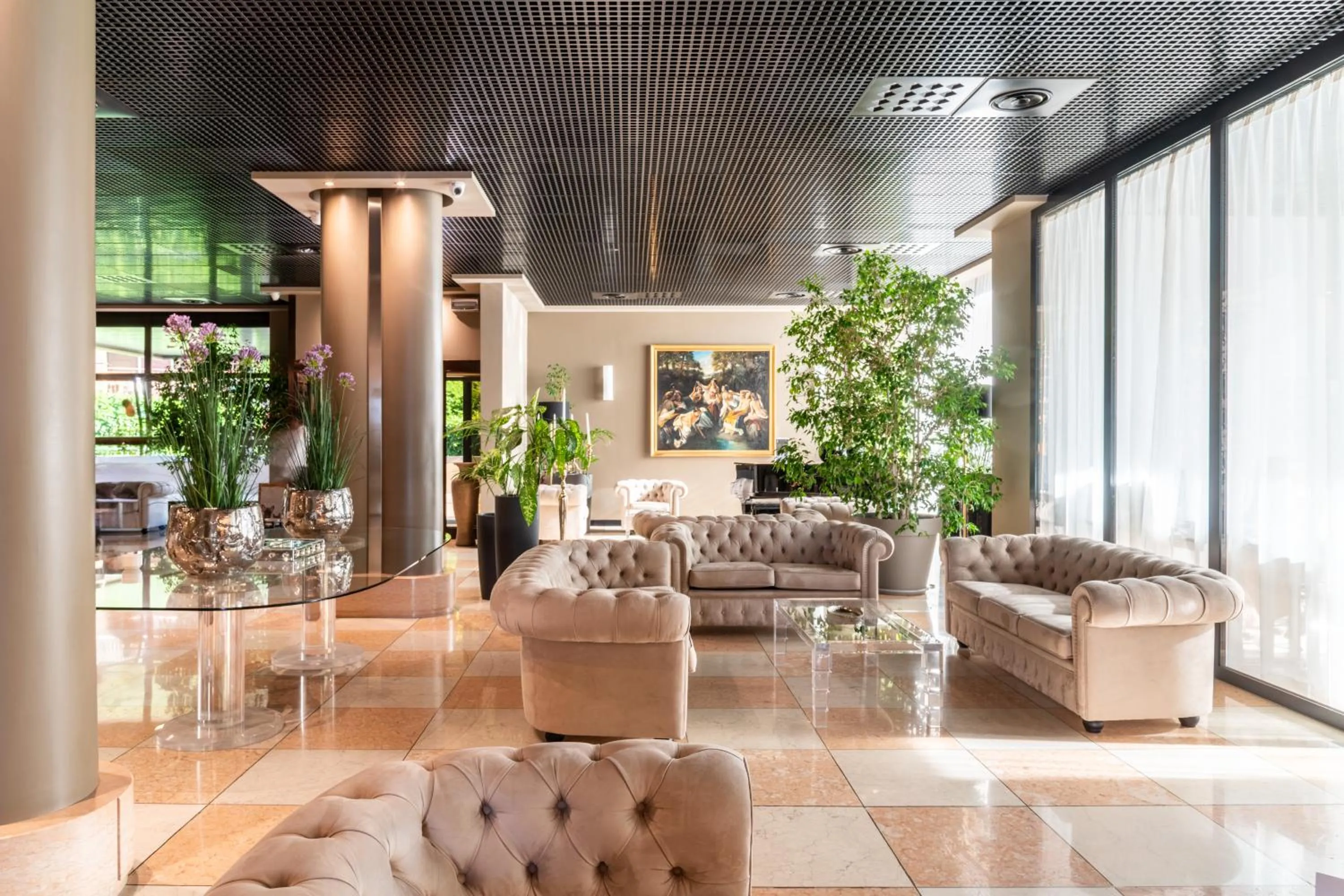 Communal lounge/ TV room in Hotel Palace Verona