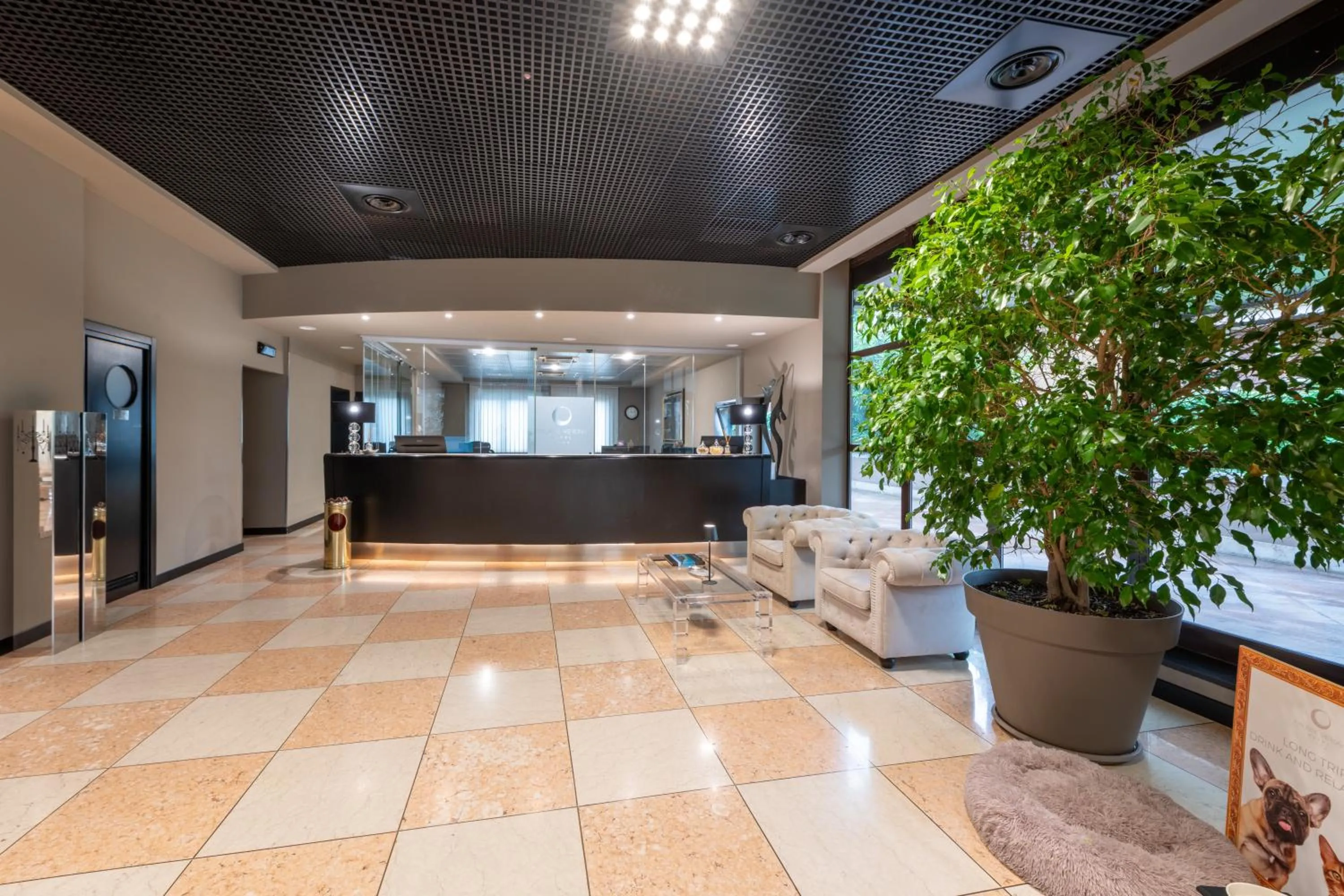 Communal lounge/ TV room in Hotel Palace Verona