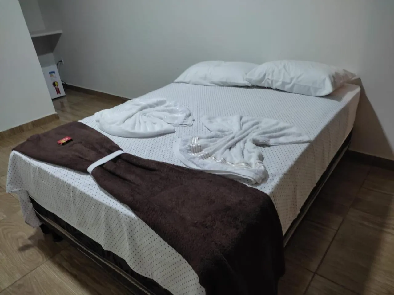 Bed in Pousada RIOSTOUR