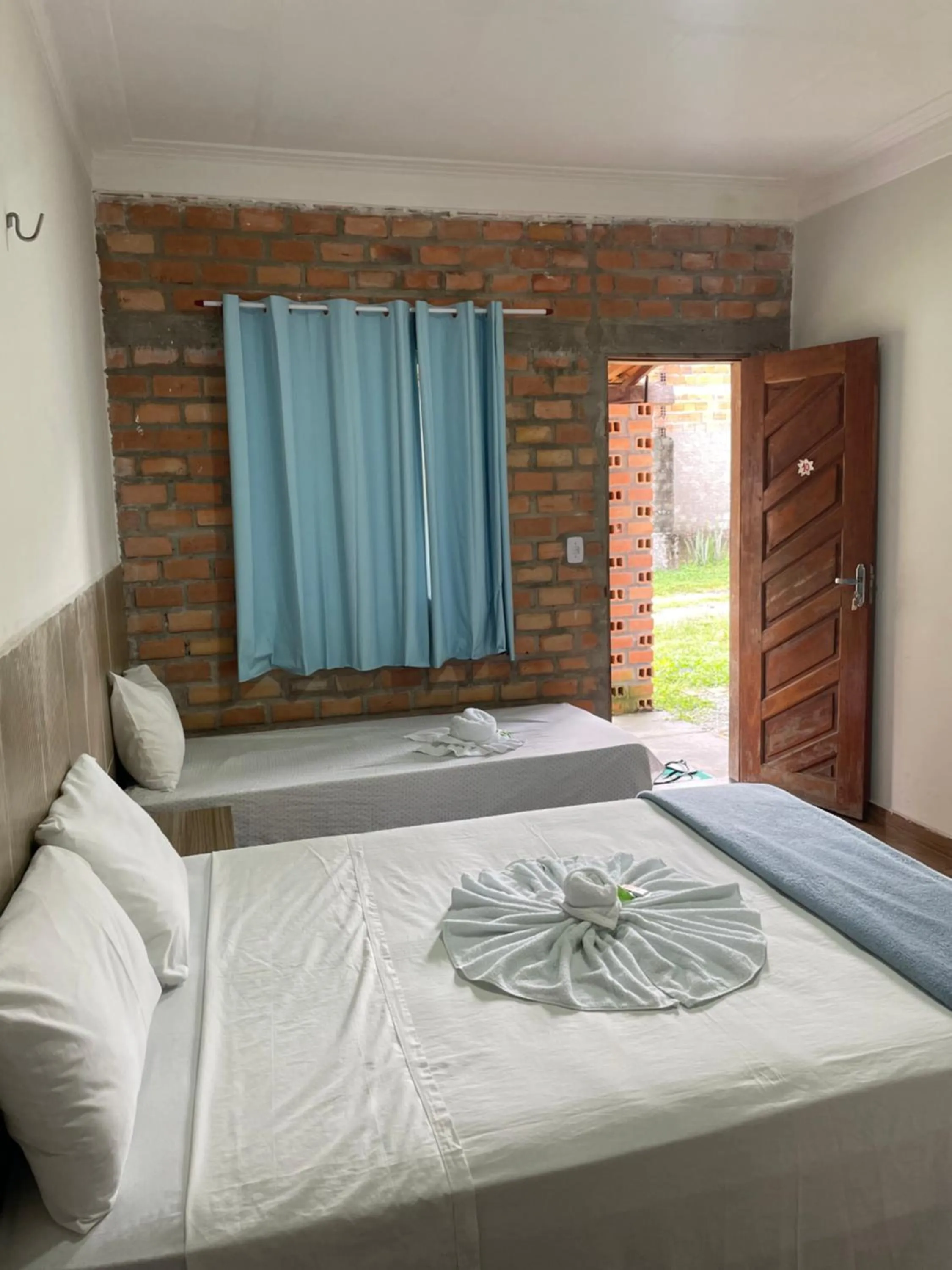 Bed in Pousada RIOSTOUR