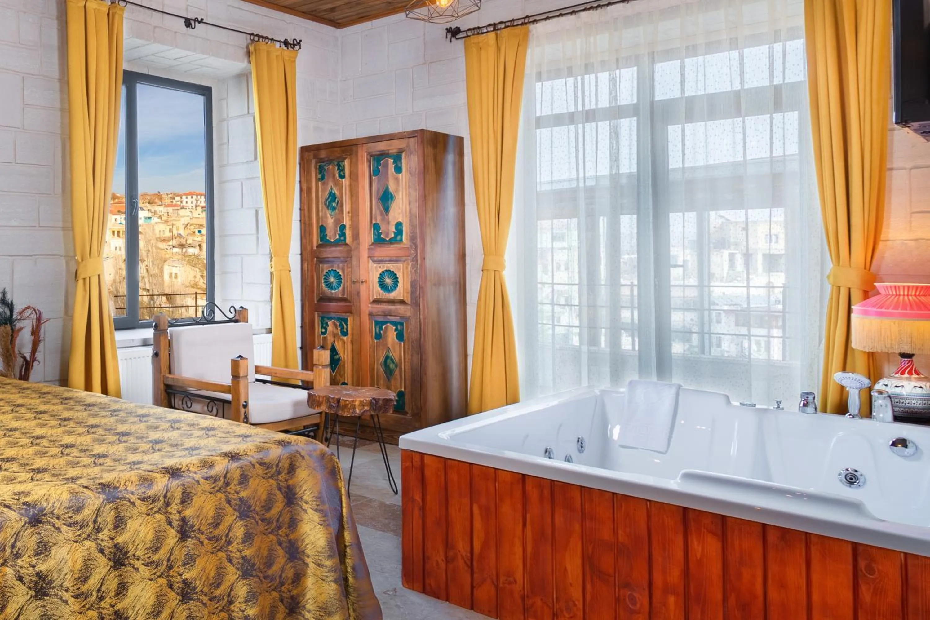 Bed in Megaron Cave Hotel Cappadocia