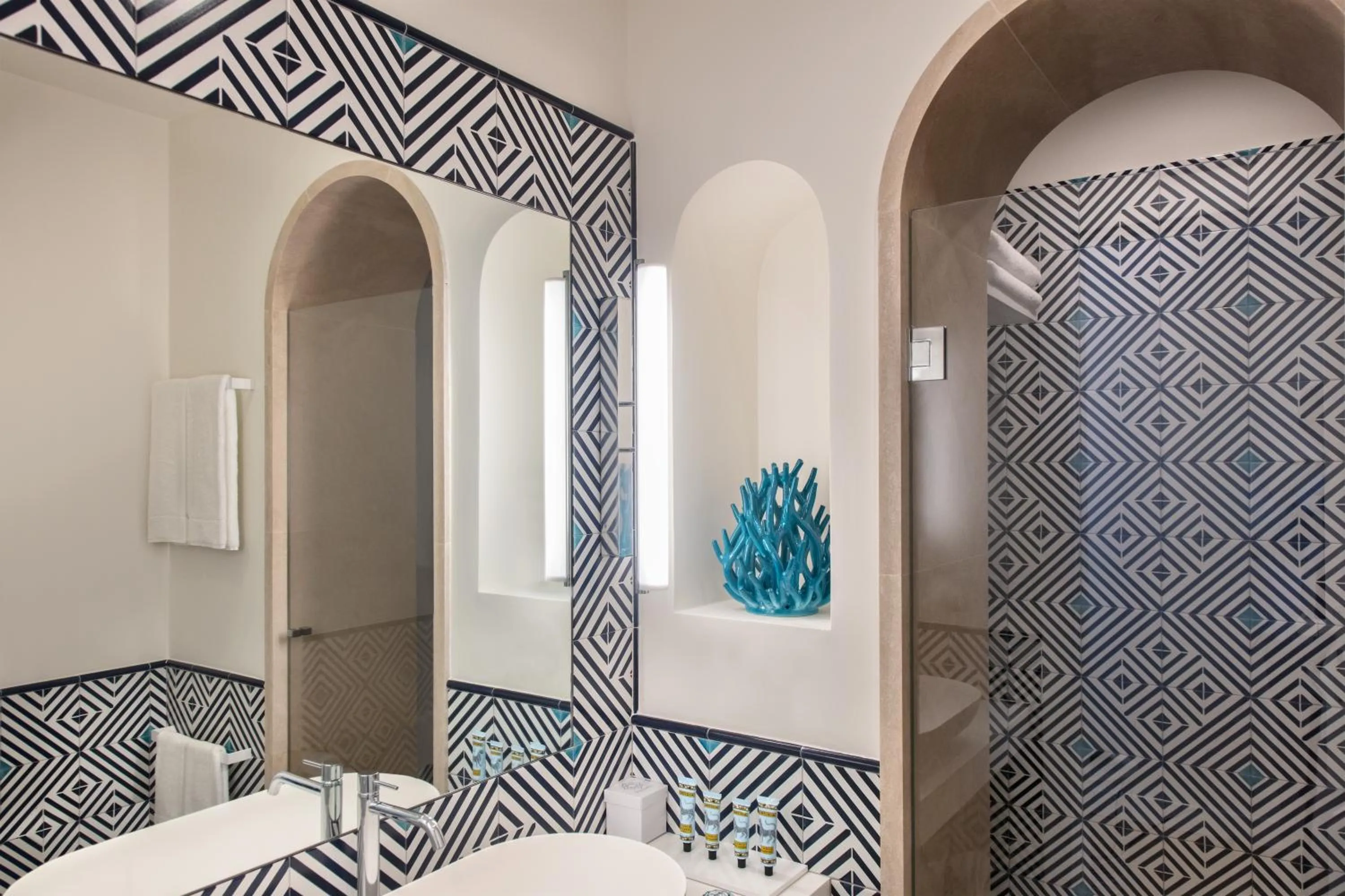 Bathroom in Pazziella Garden & Suites