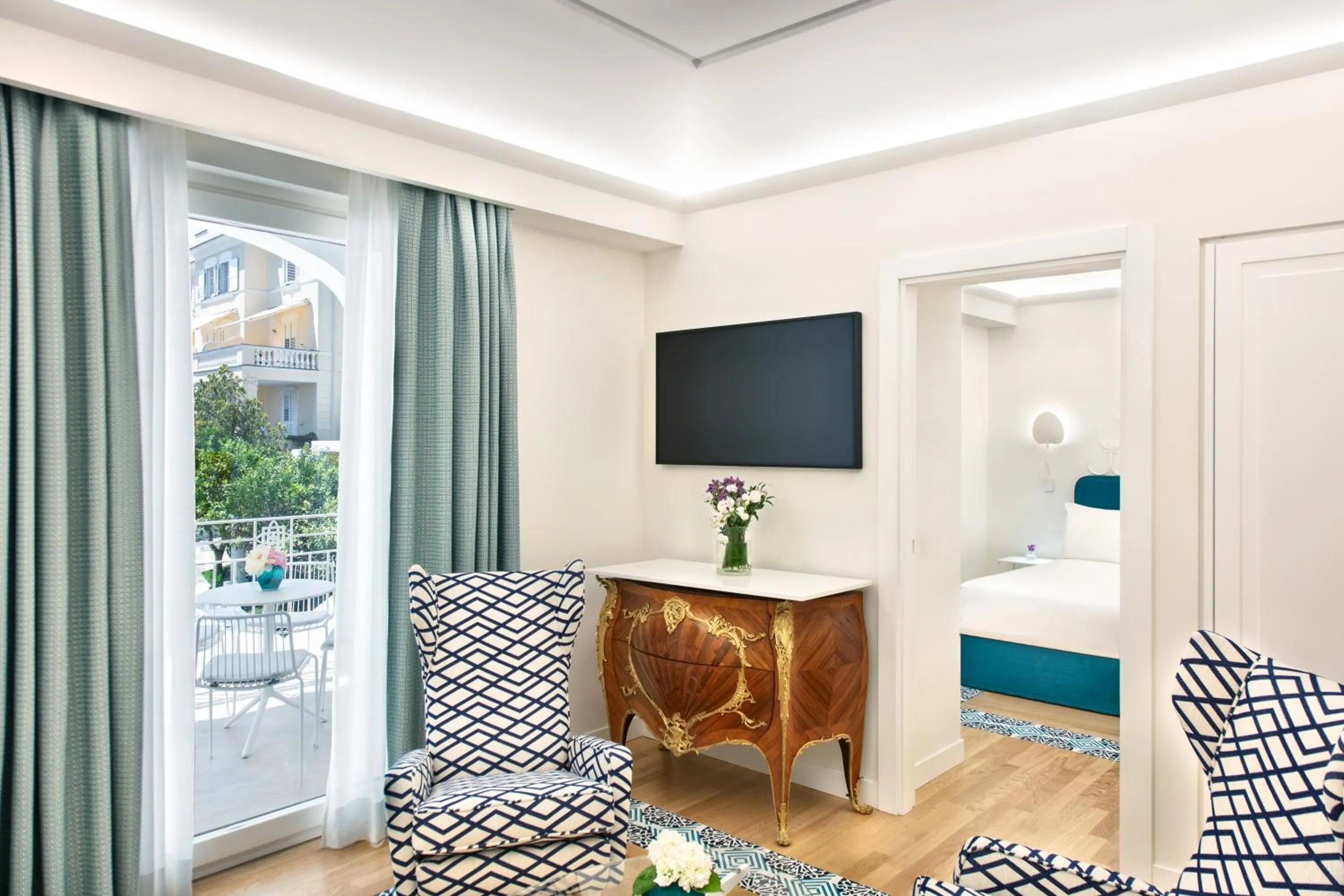 Living room, Bed in Pazziella Garden & Suites