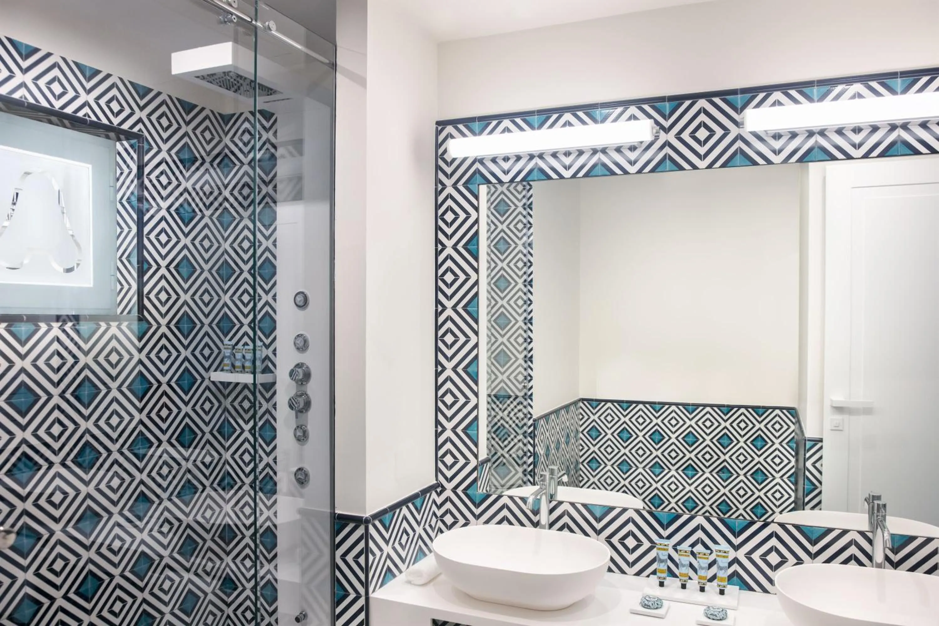 Bathroom in Pazziella Garden & Suites