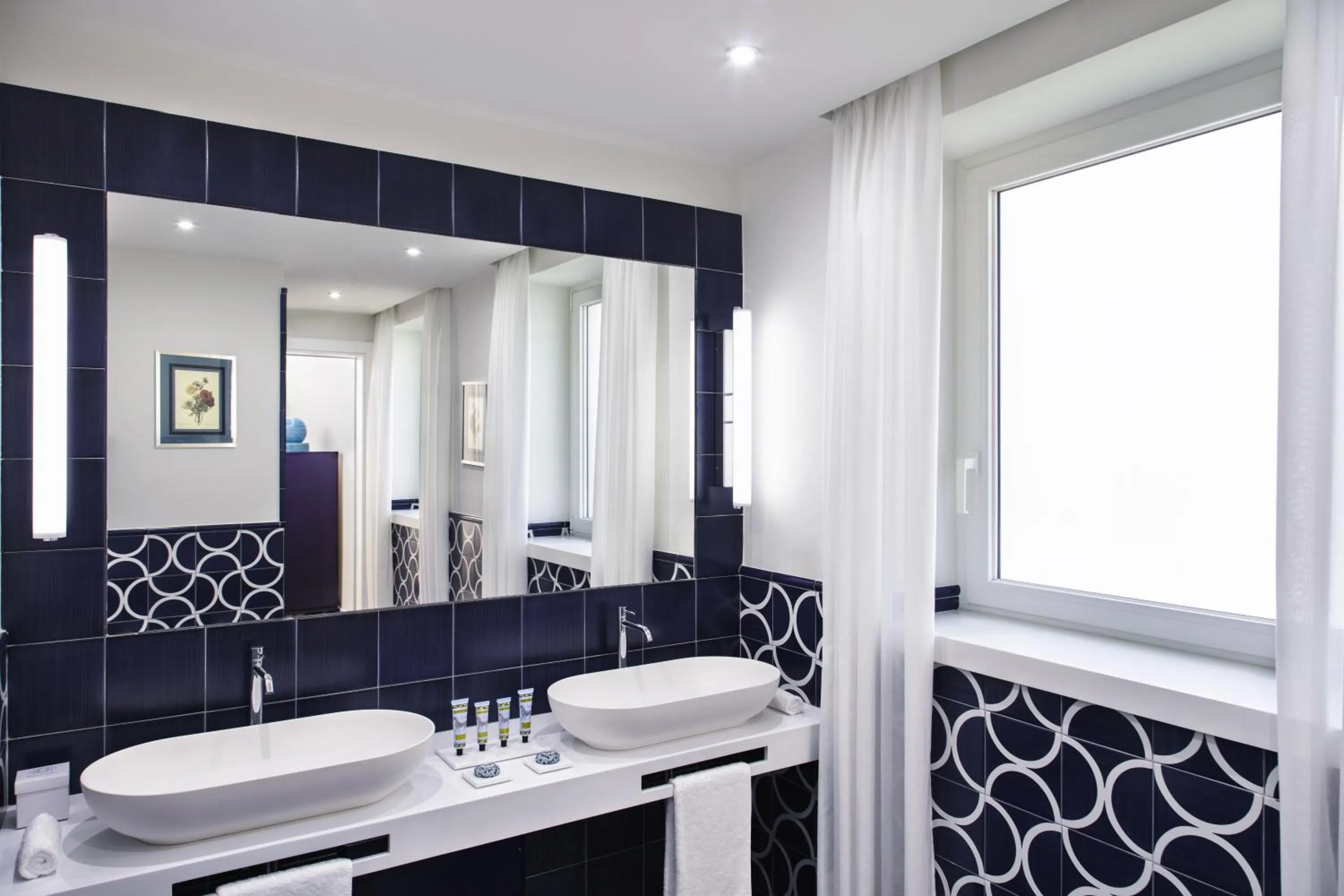 Bathroom in Pazziella Garden & Suites