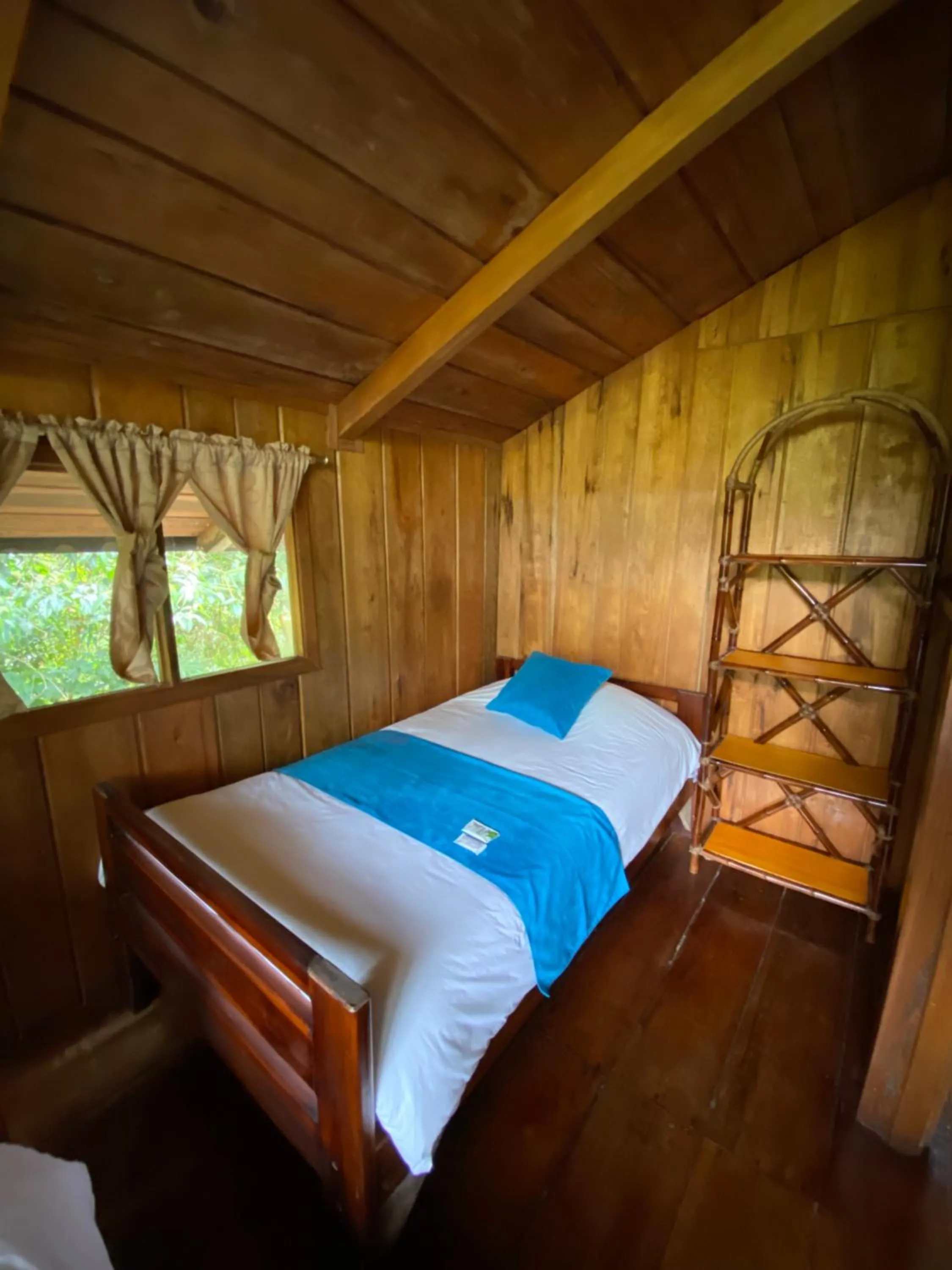 Bed in Hostería Arasari