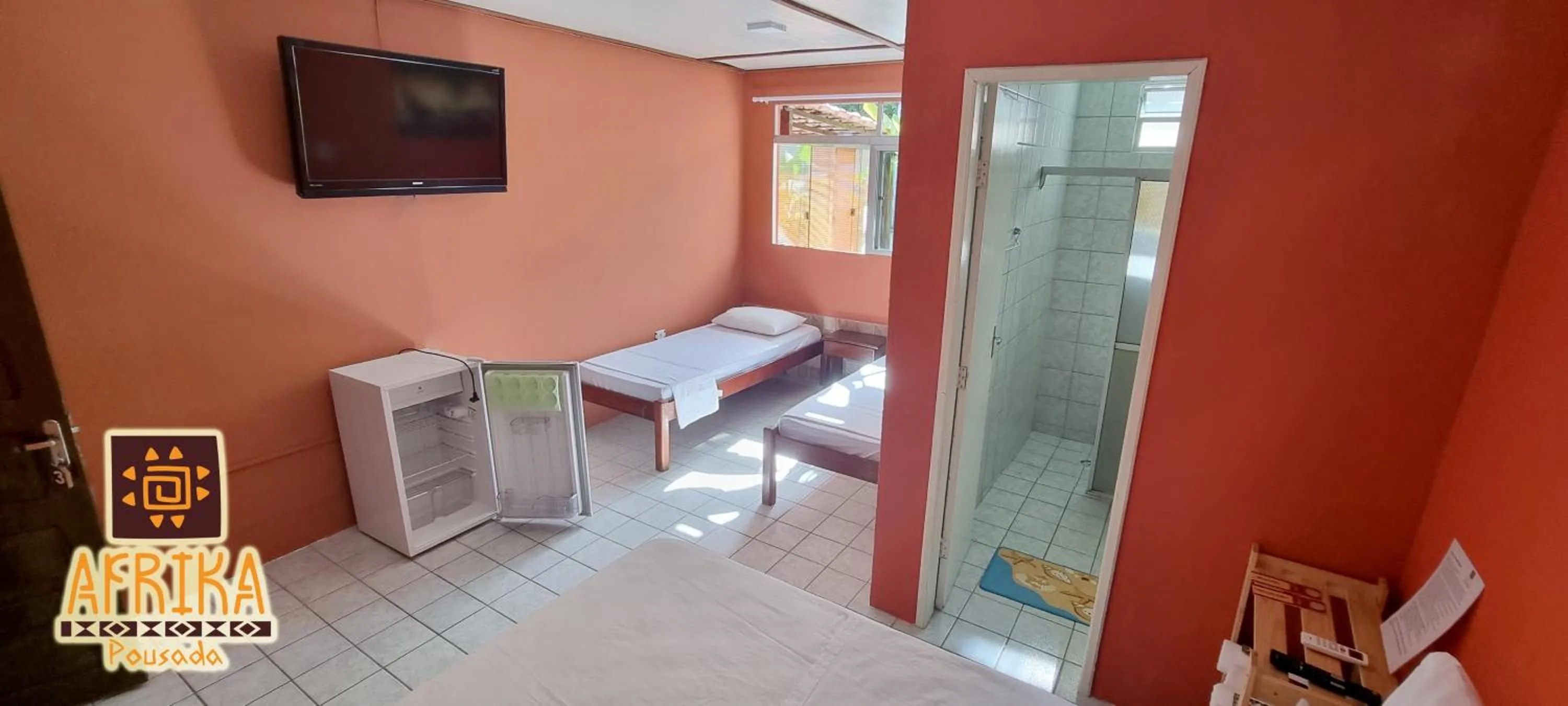 Bedroom in Pousada Afrika