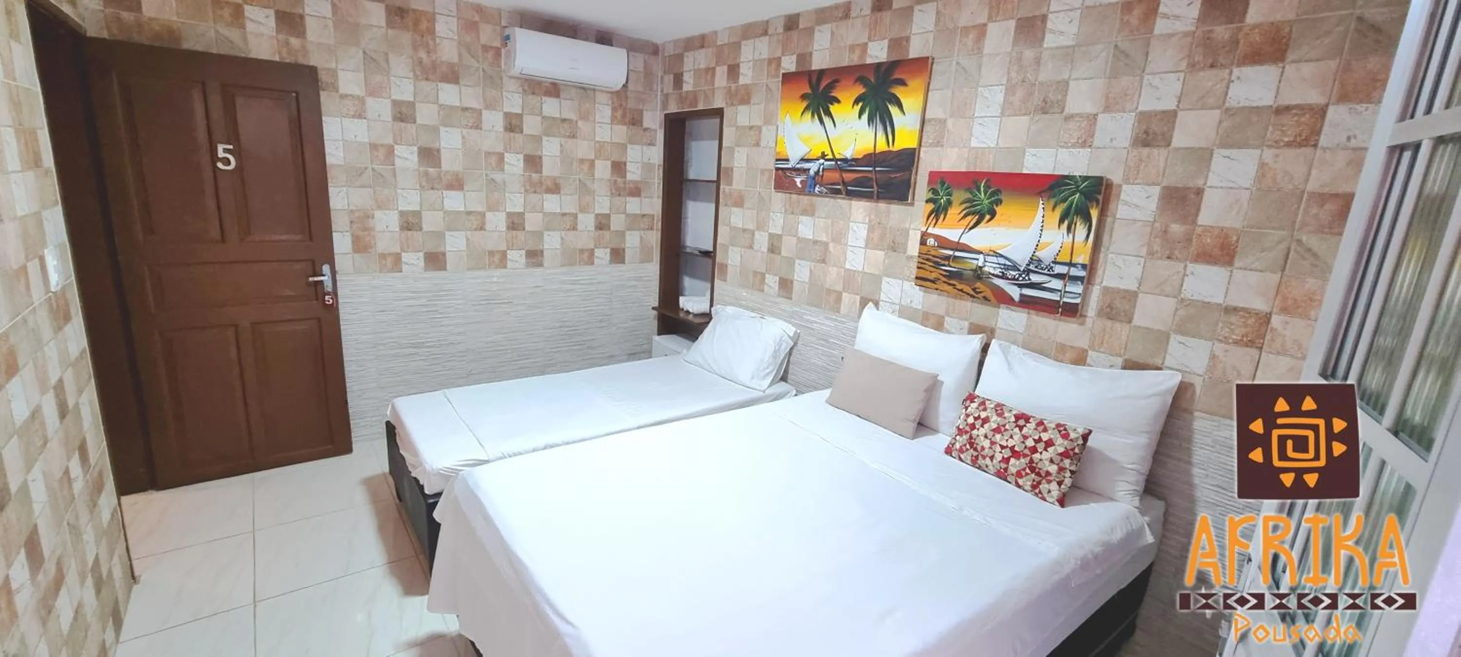 Bed in Pousada Afrika