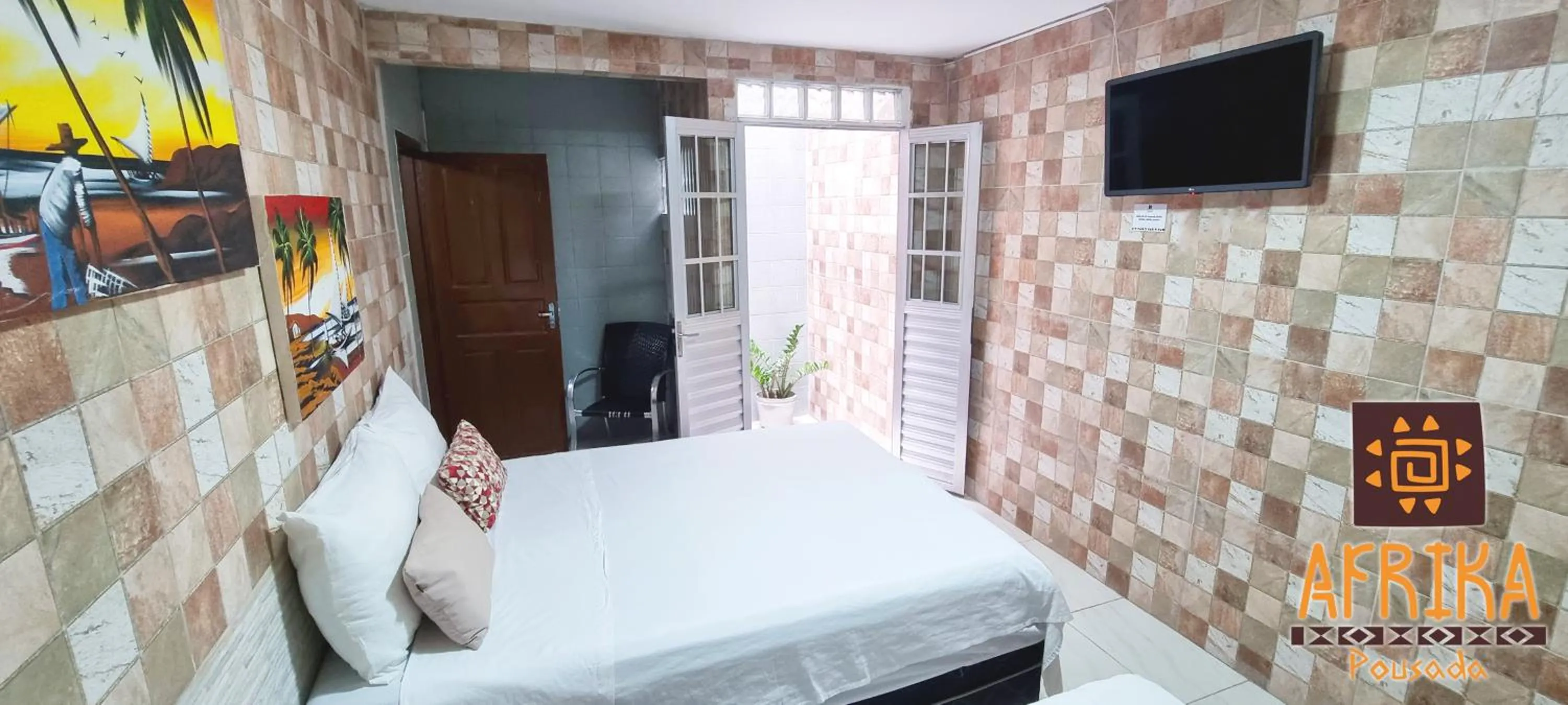 Balcony/Terrace, Bed in Pousada Afrika