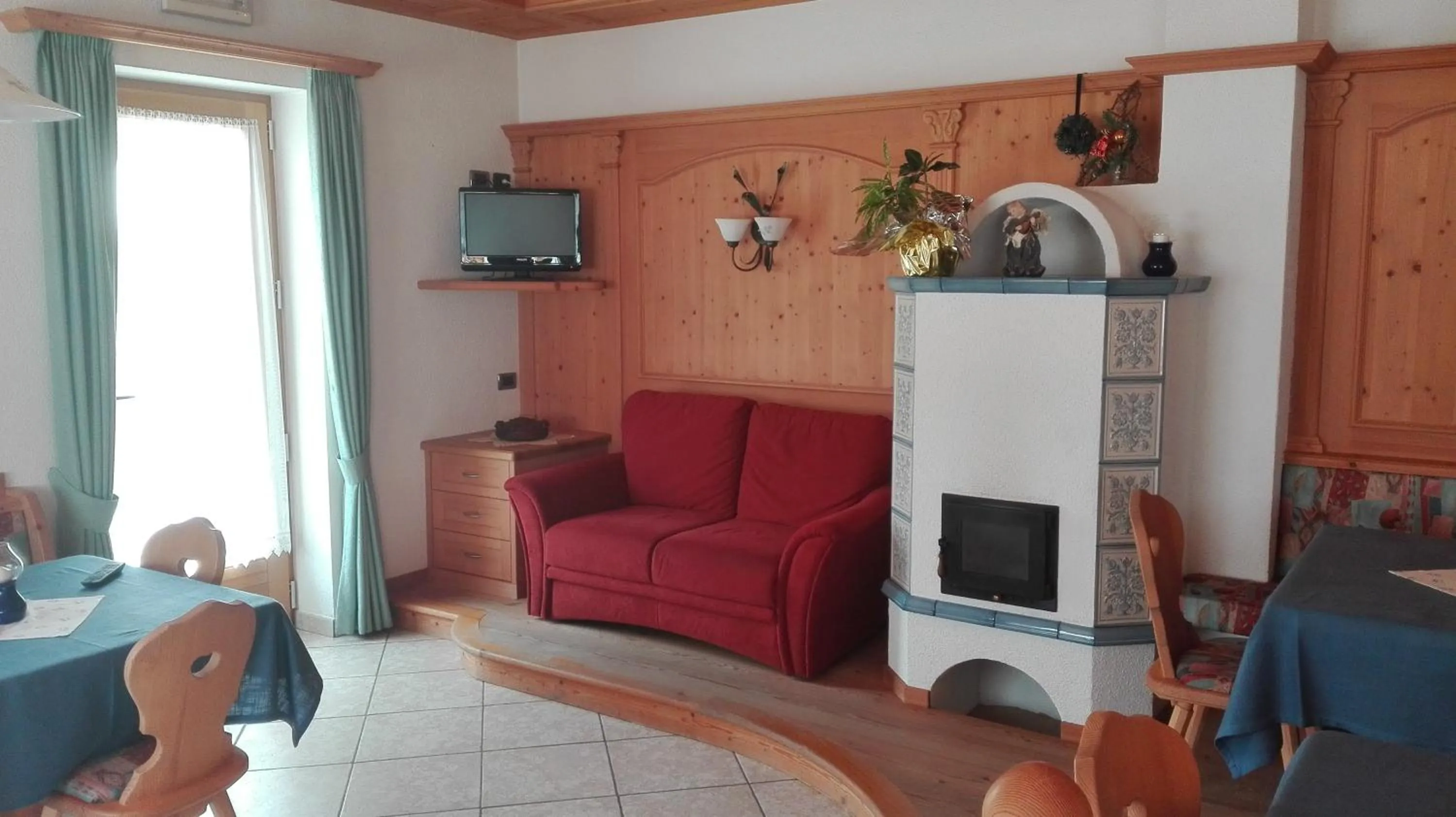 Communal lounge/ TV room in Garnì Astor