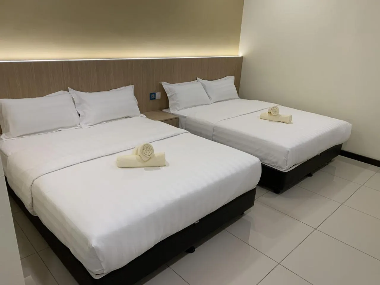 Bed in M Quality Hotel