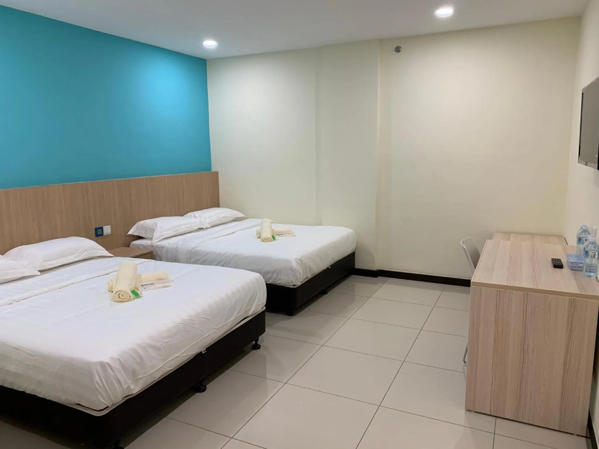 Bedroom in M Quality Hotel