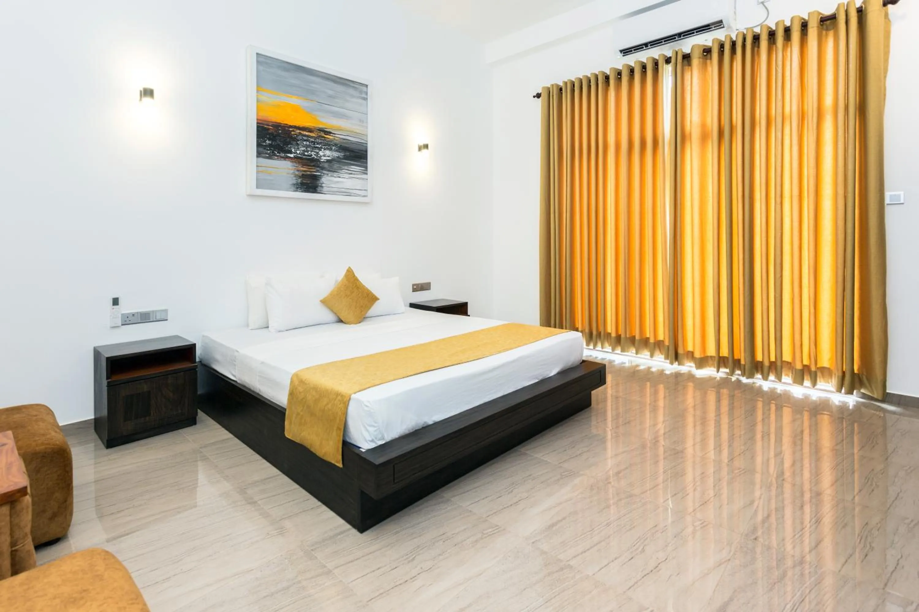 Bed in Polhena Grand Resort & Banquet