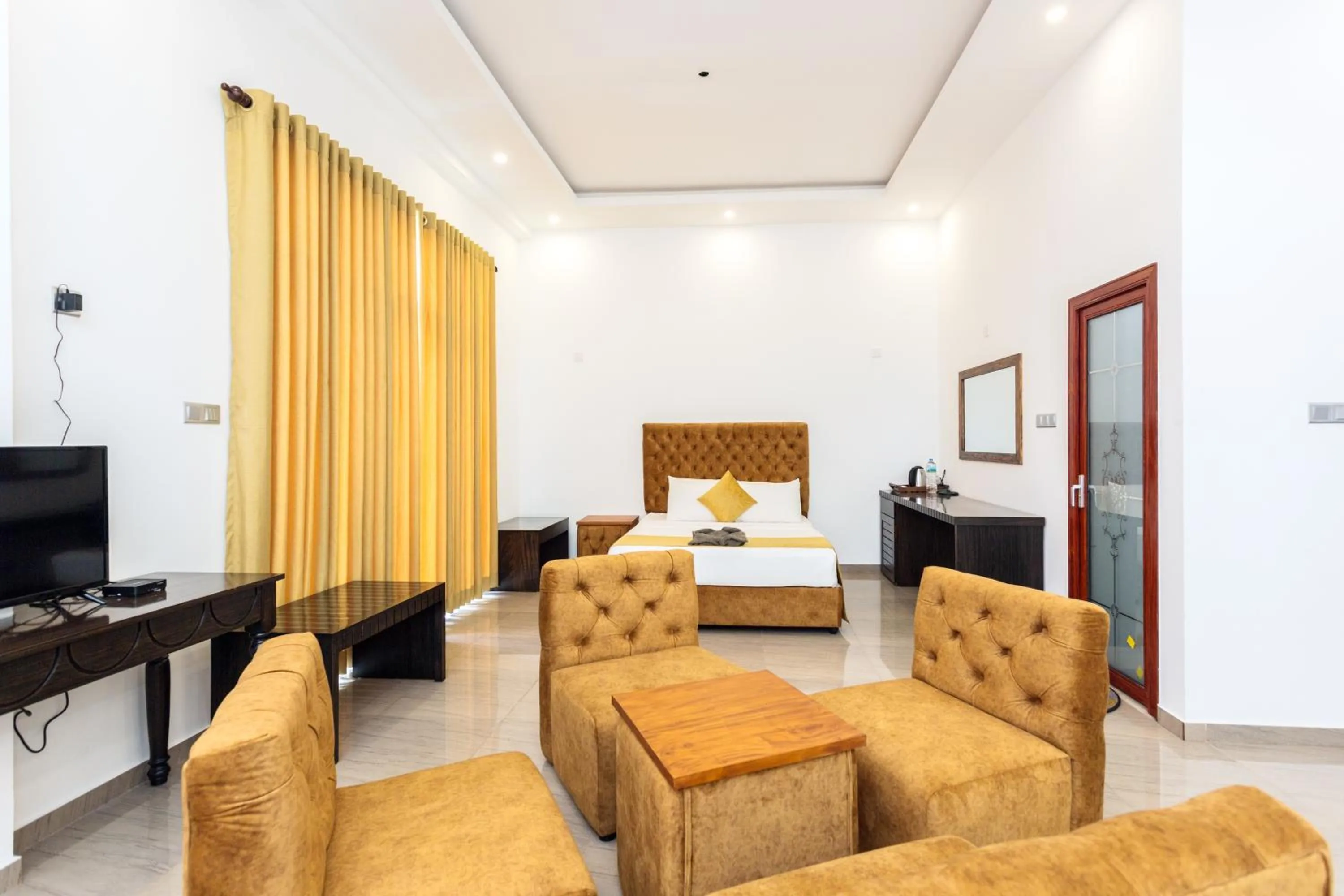 Seating area, Bed in Polhena Grand Resort & Banquet