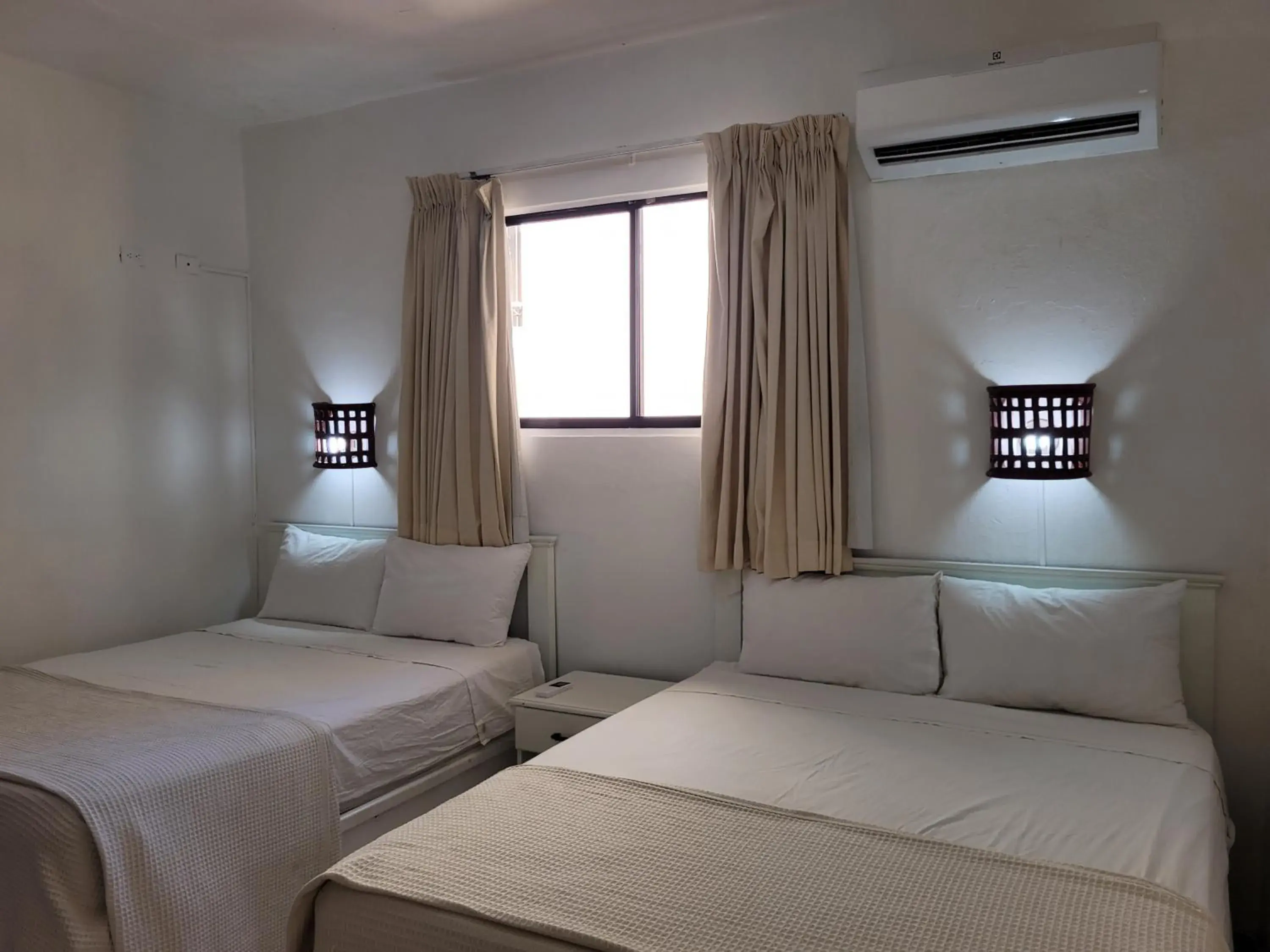 Queen Room with Two Queen Beds - single occupancy in Drake Bolivar Santo Domingo Queen Room with Two Queen Beds - single occupancy in Drake Bolivar Santo Domingo