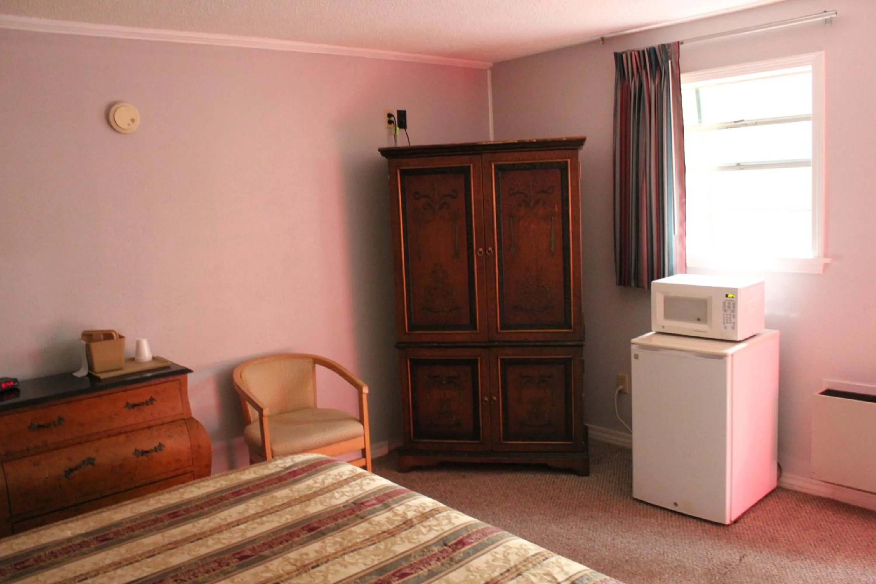 Bed in Brydan Suites