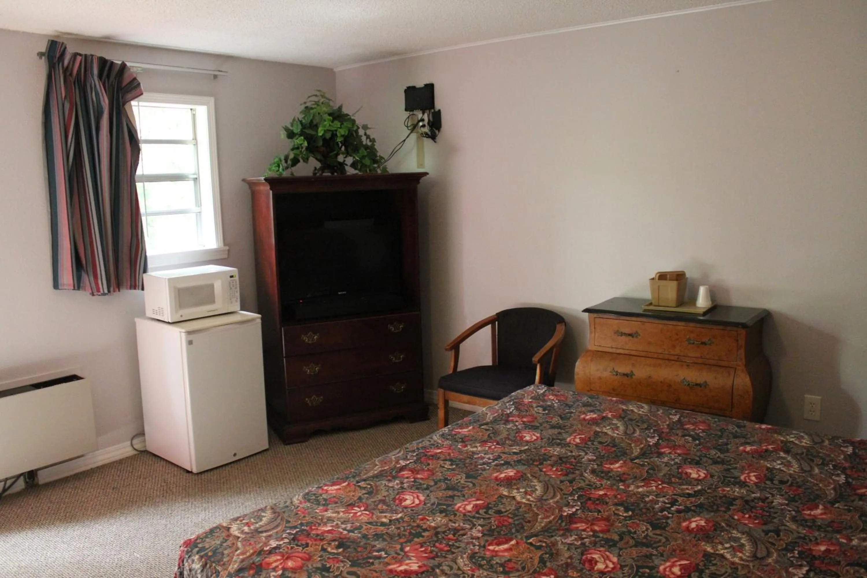 Bed in Brydan Suites