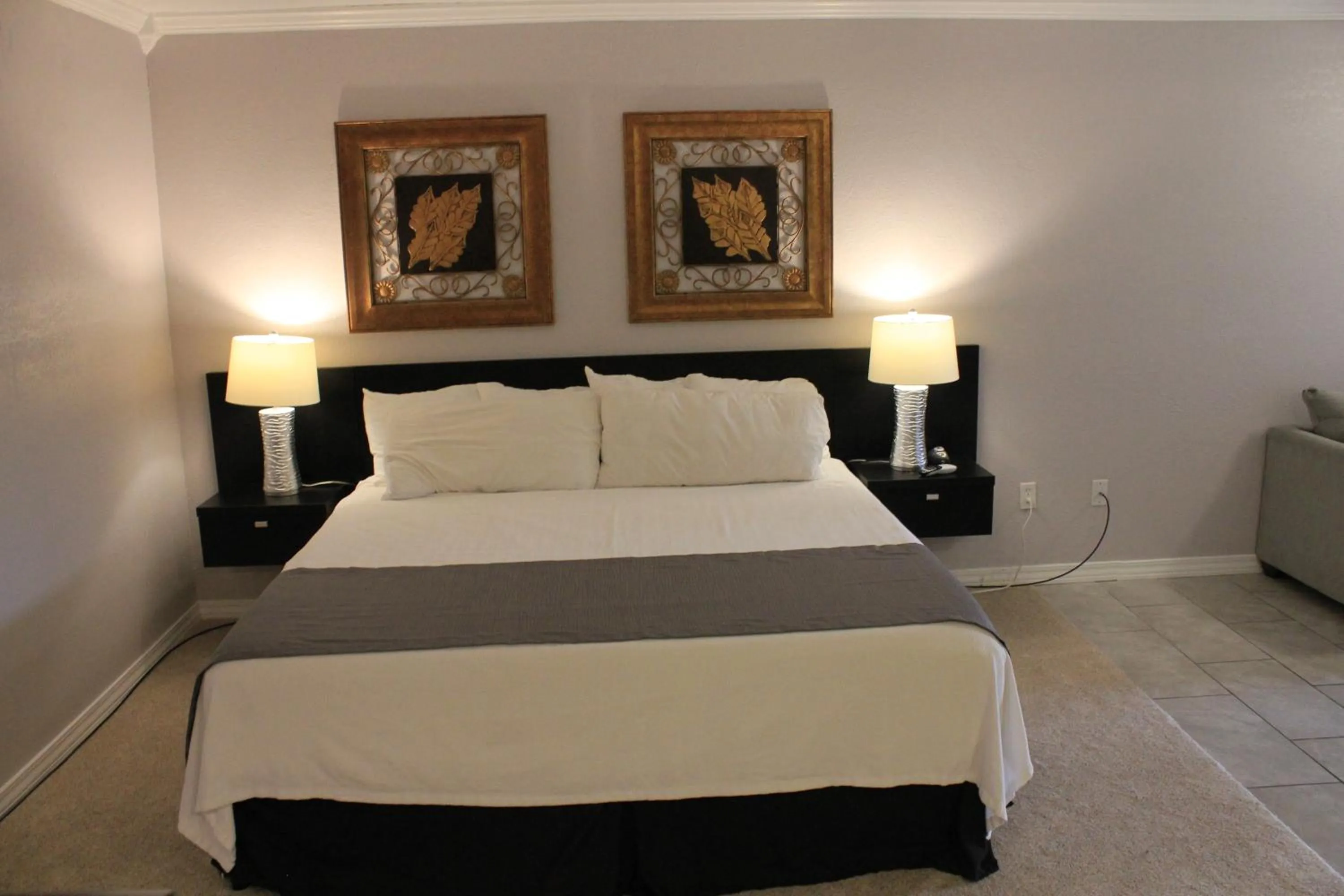 Bed in Brydan Suites