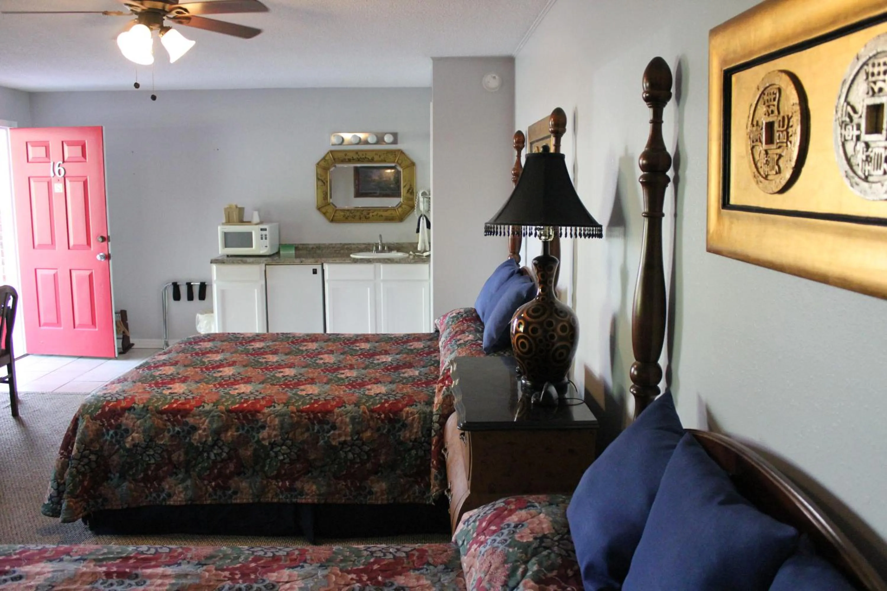 Bed in Brydan Suites