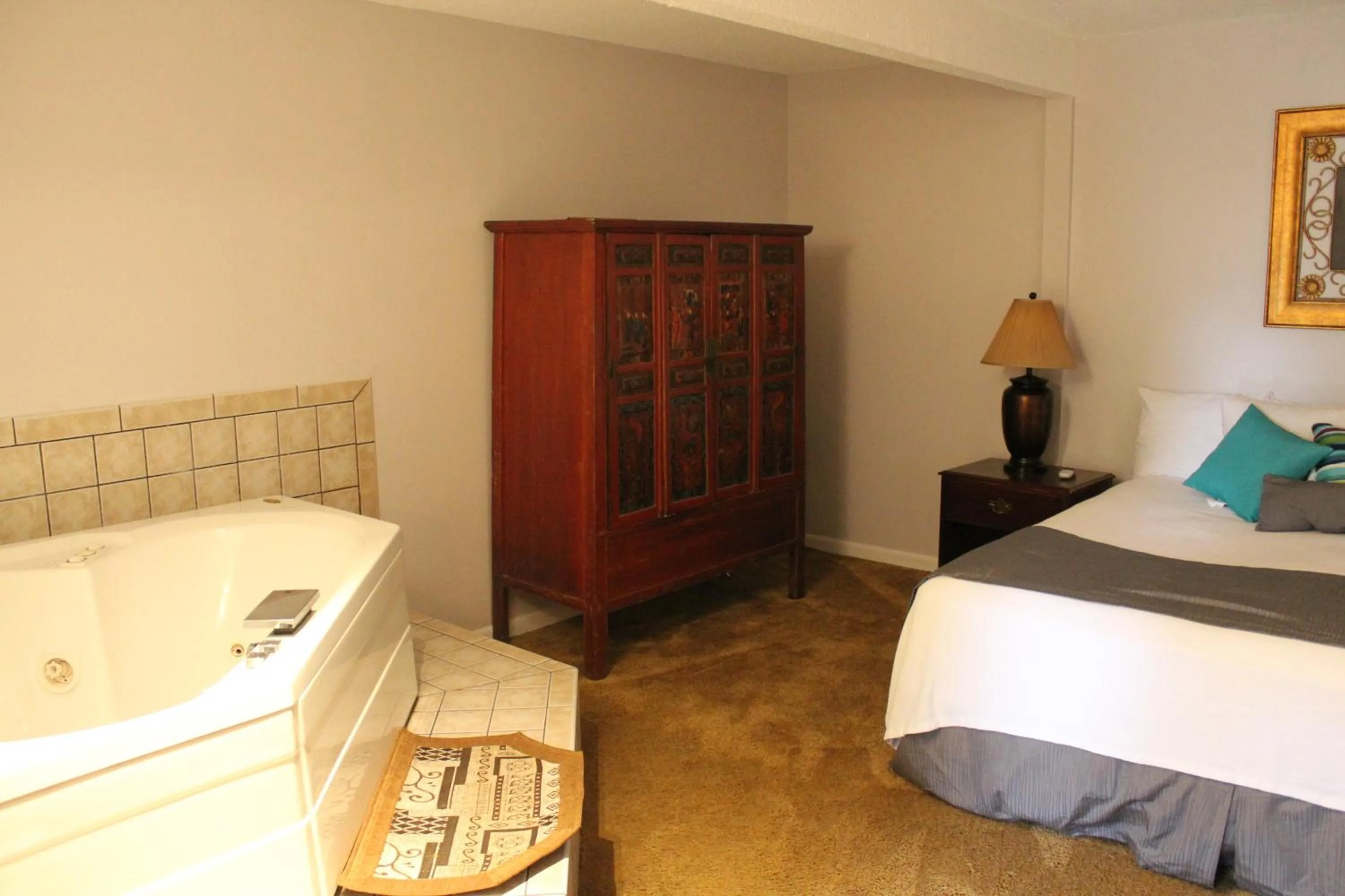 Bed in Brydan Suites