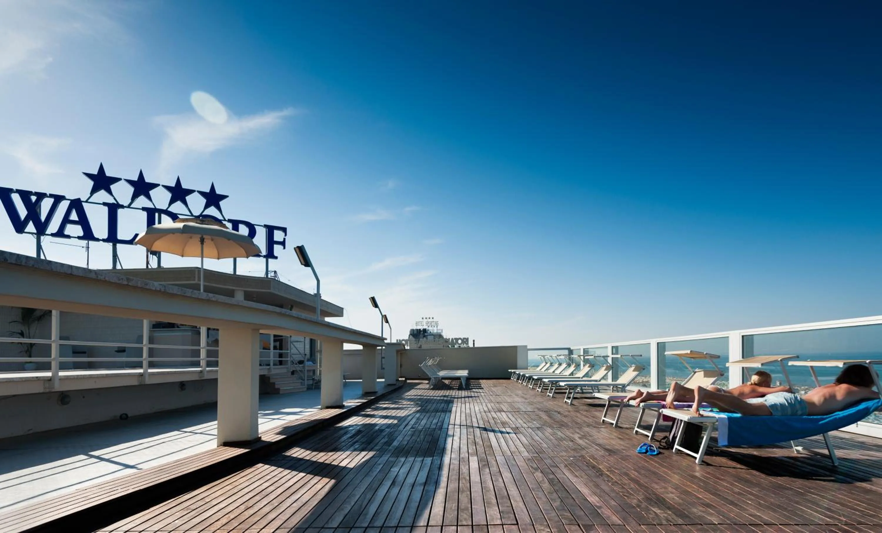 People in Waldorf Suite Hotel