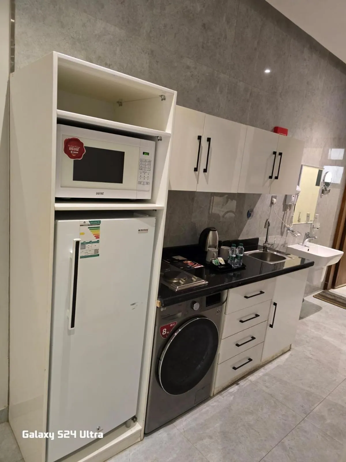 Kitchen or kitchenette in Celine Home Serviced Apartment - Tuwaiq