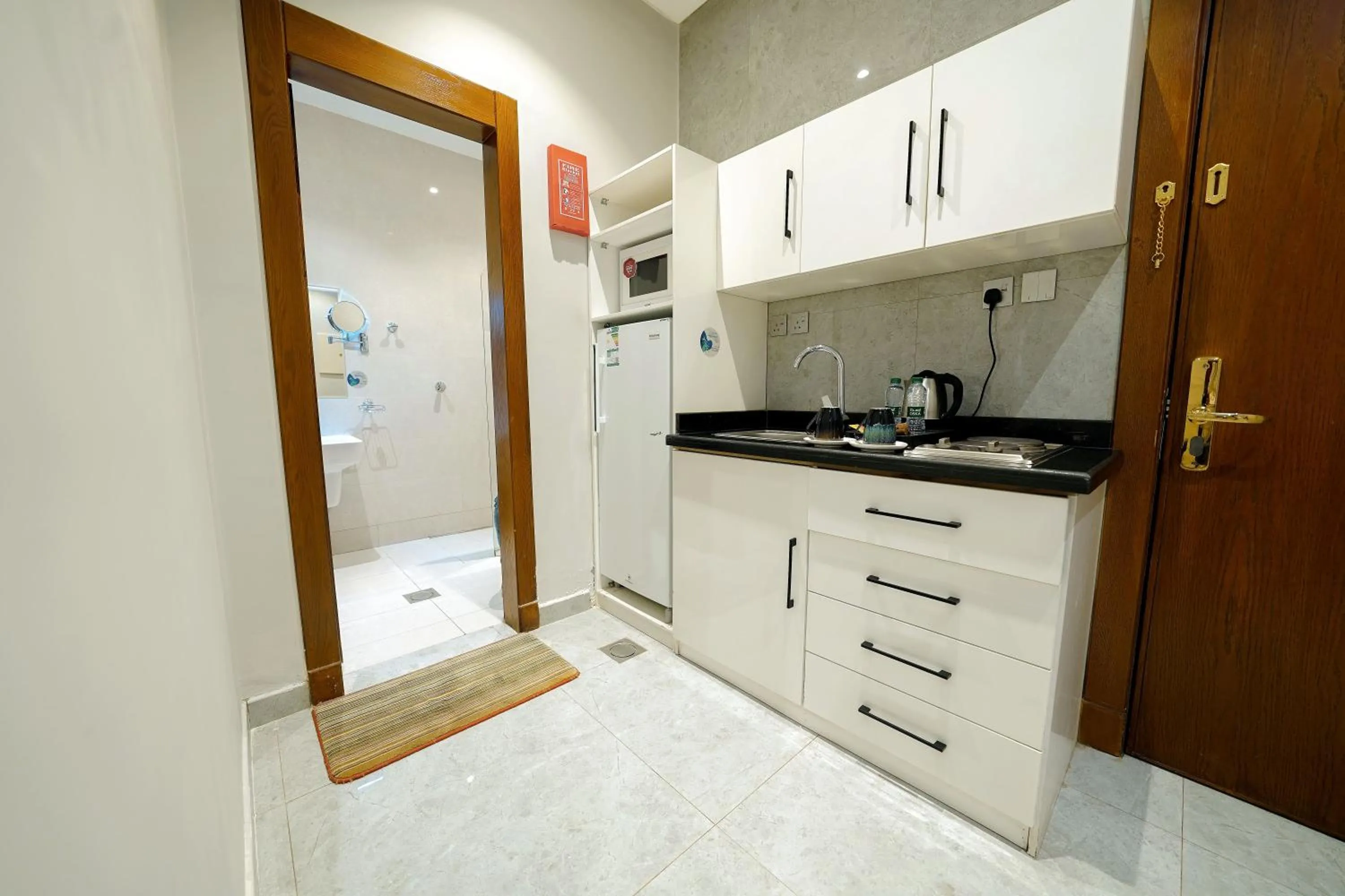 Kitchen or kitchenette in Celine Home Serviced Apartment - Tuwaiq