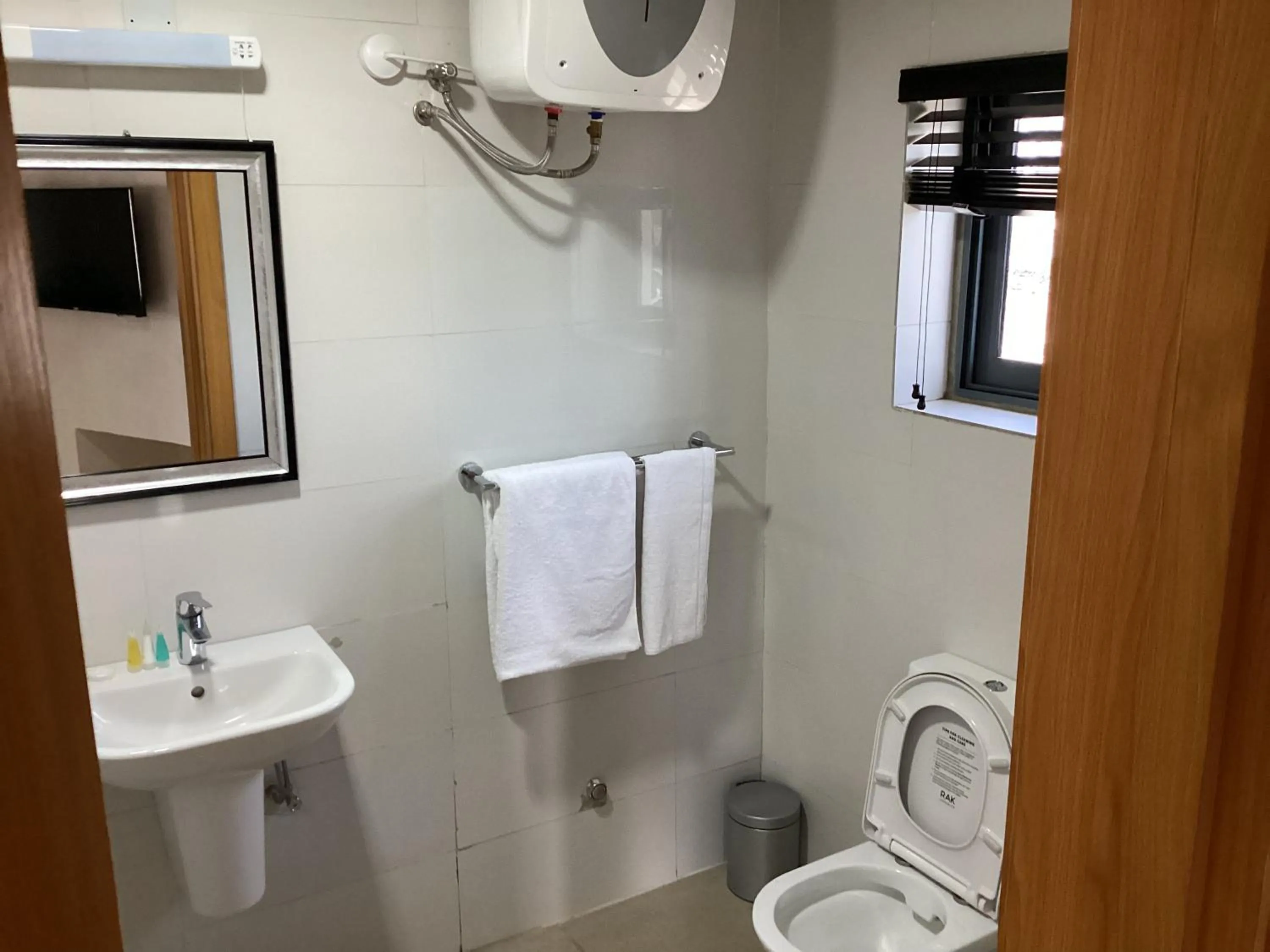 Toilet in Adis Hotels Prime