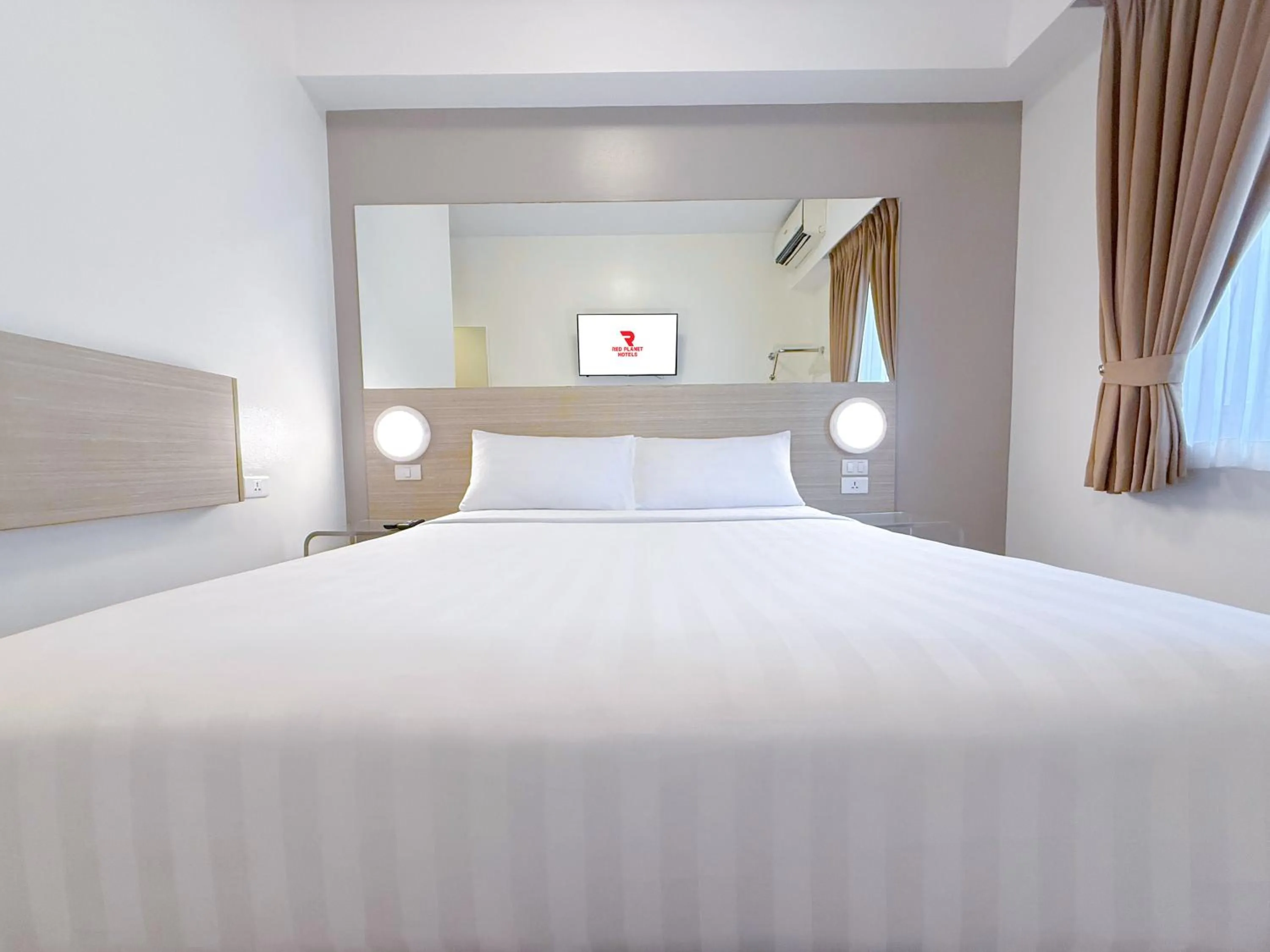 Bed in Red Planet Ortigas