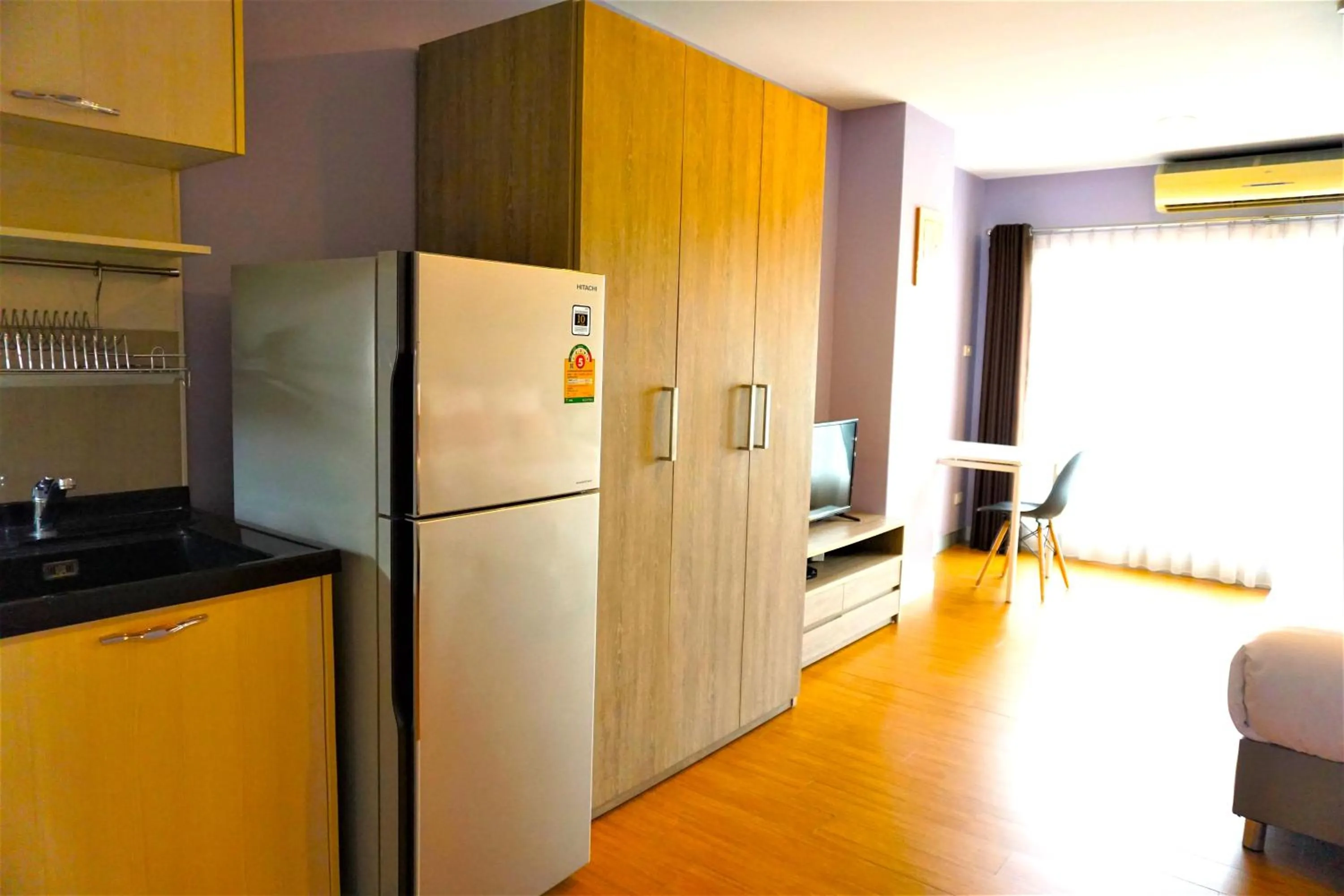 Kitchen or kitchenette in Nest n Rest Hotel