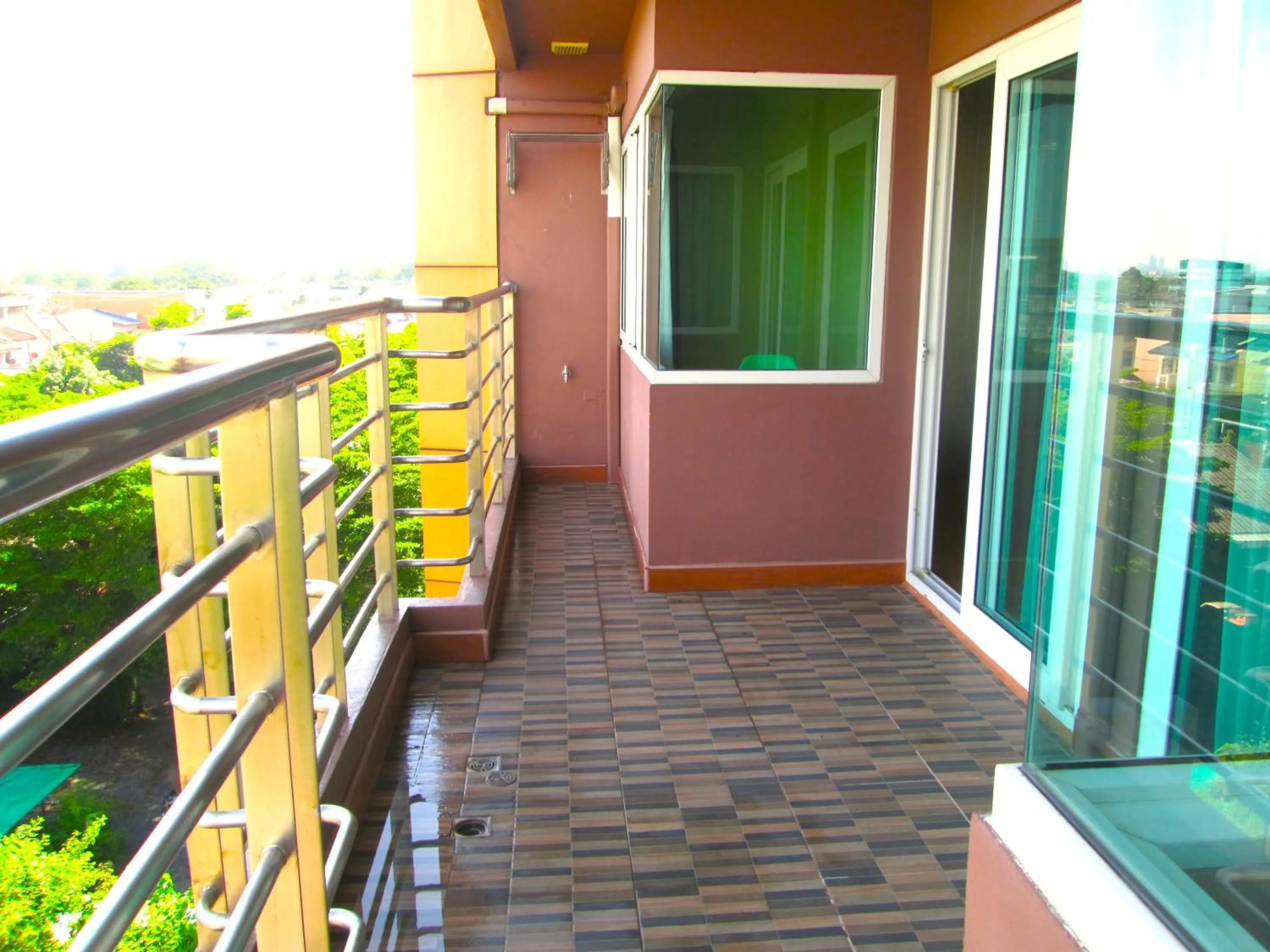 Balcony/Terrace in Nest n Rest Hotel