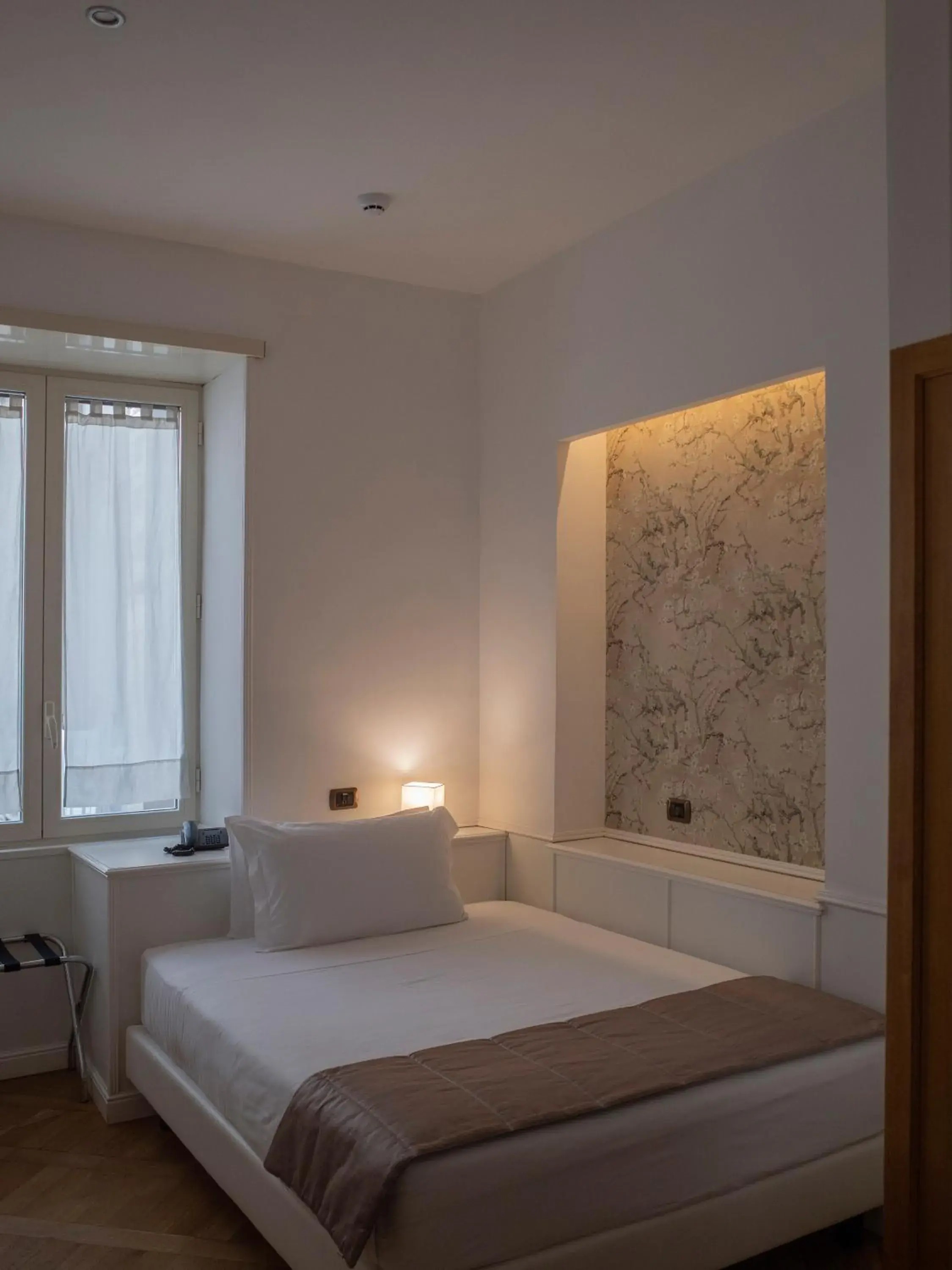 Bed in Grand Hotel Europa & Restaurant Bed in Grand Hotel Europa & Restaurant