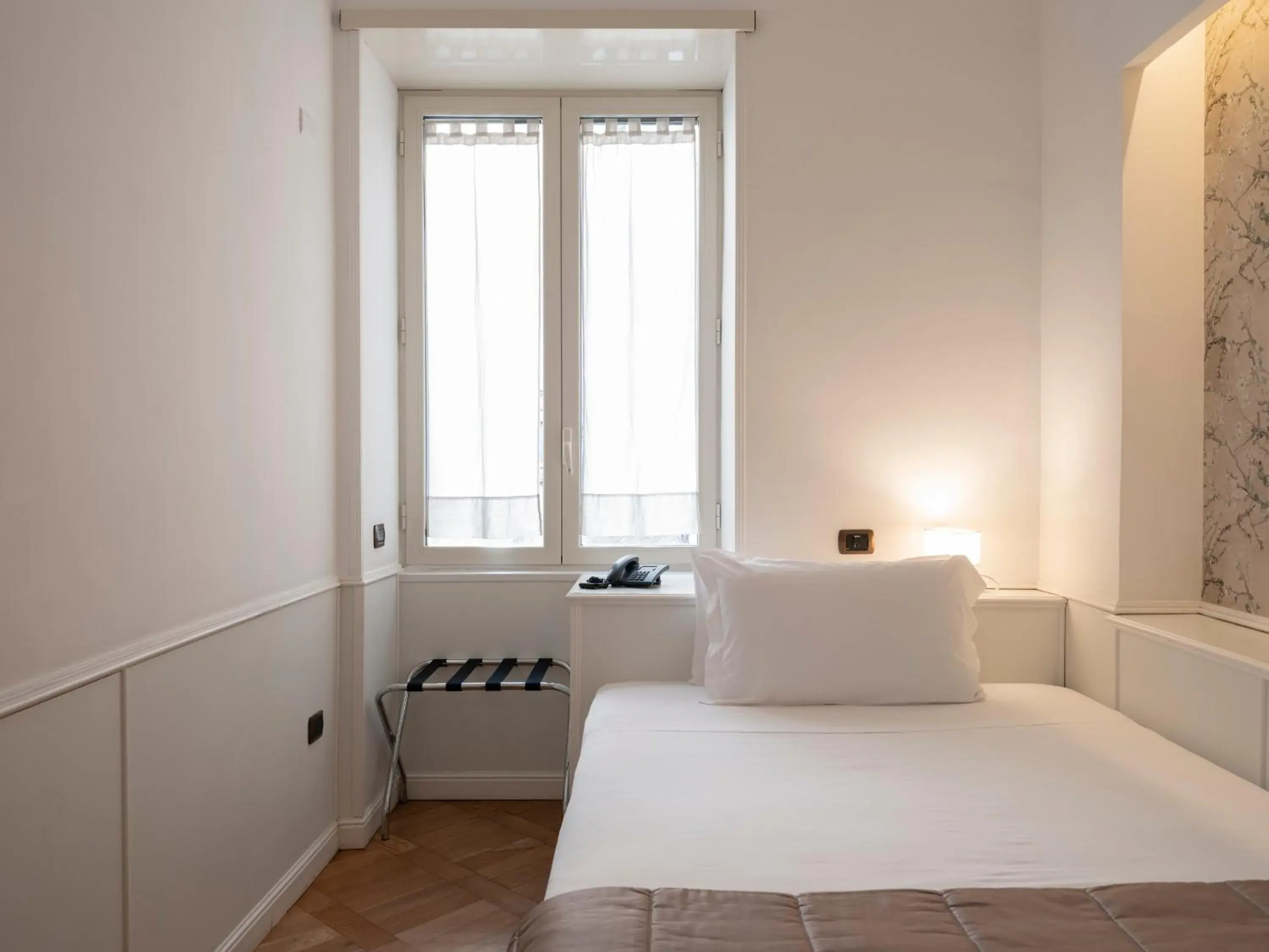 Bed in Grand Hotel Europa & Restaurant Bed in Grand Hotel Europa & Restaurant