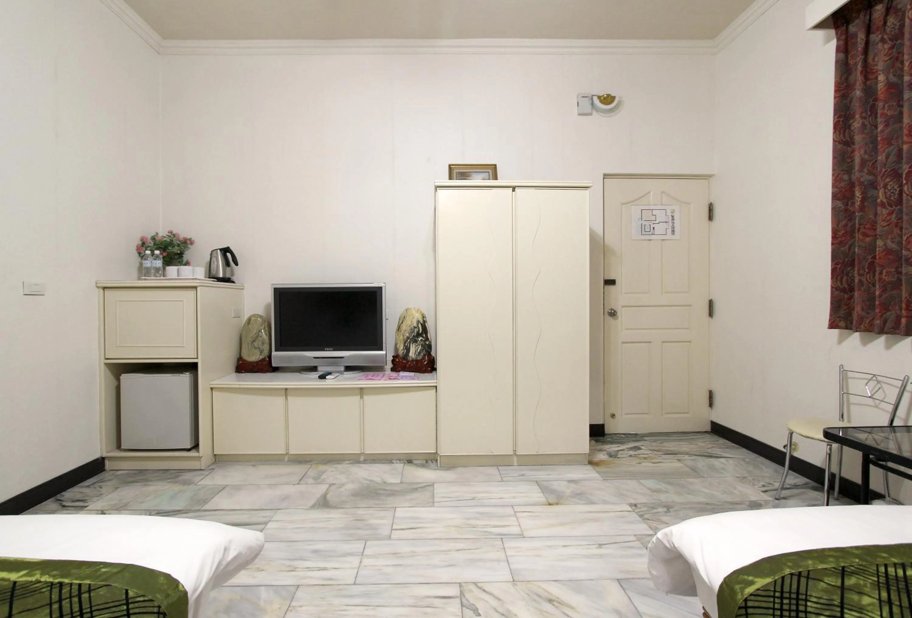 Bedroom, Bed in 陶陶居商旅 Tautauchu Hotel