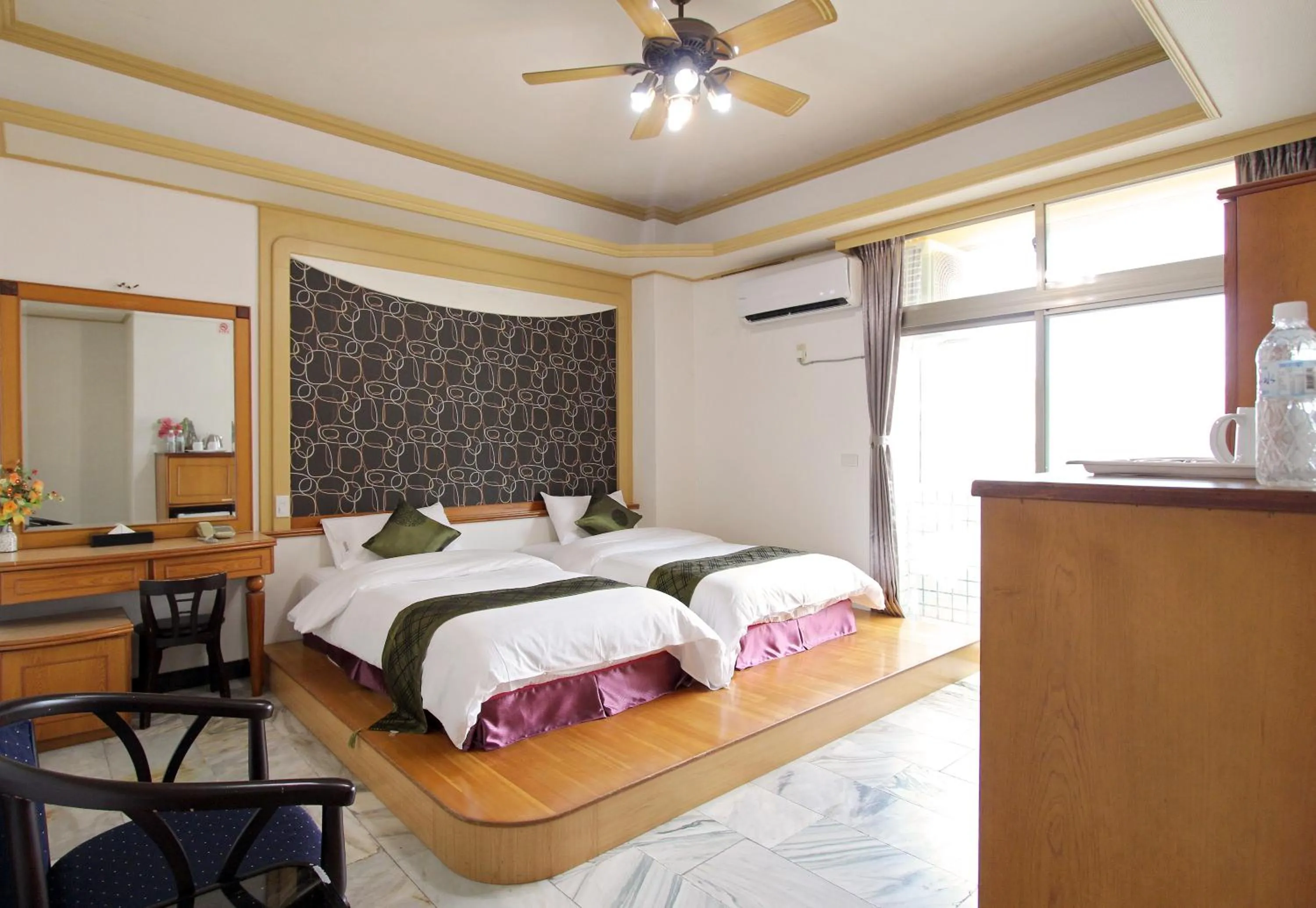 Bed in 陶陶居商旅 Tautauchu Hotel