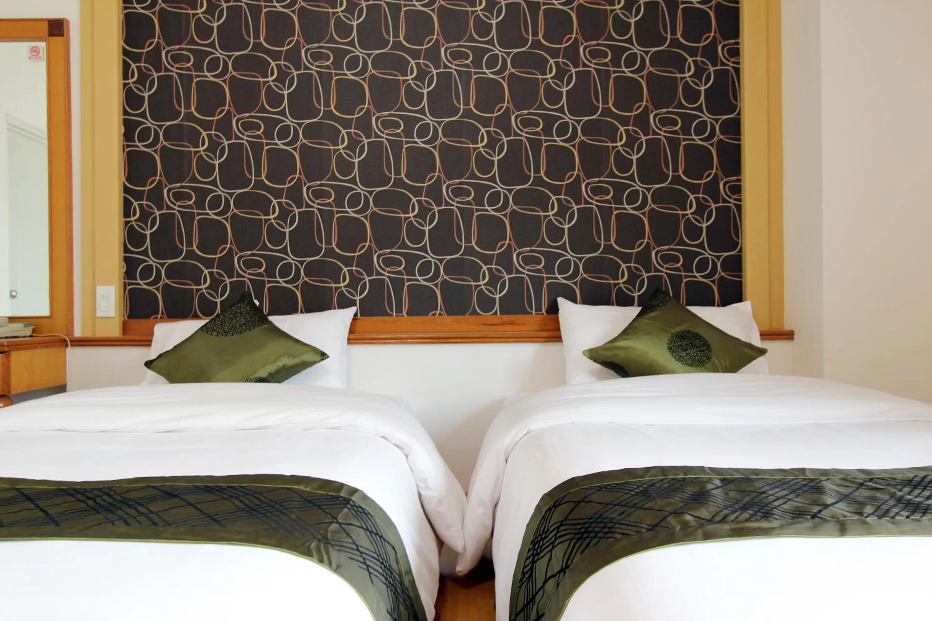 Bedroom, Bed in 陶陶居商旅 Tautauchu Hotel