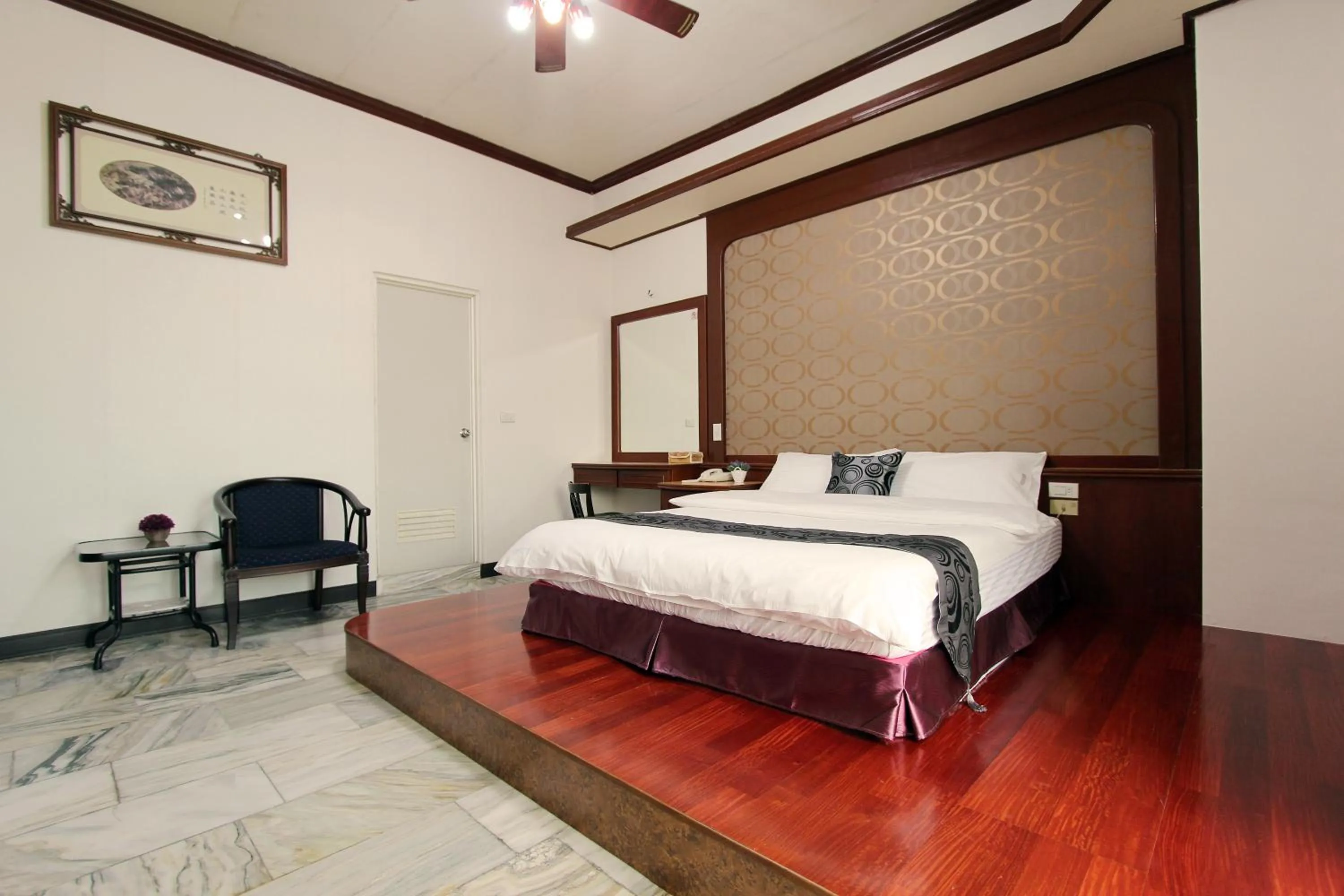 Bed in 陶陶居商旅 Tautauchu Hotel