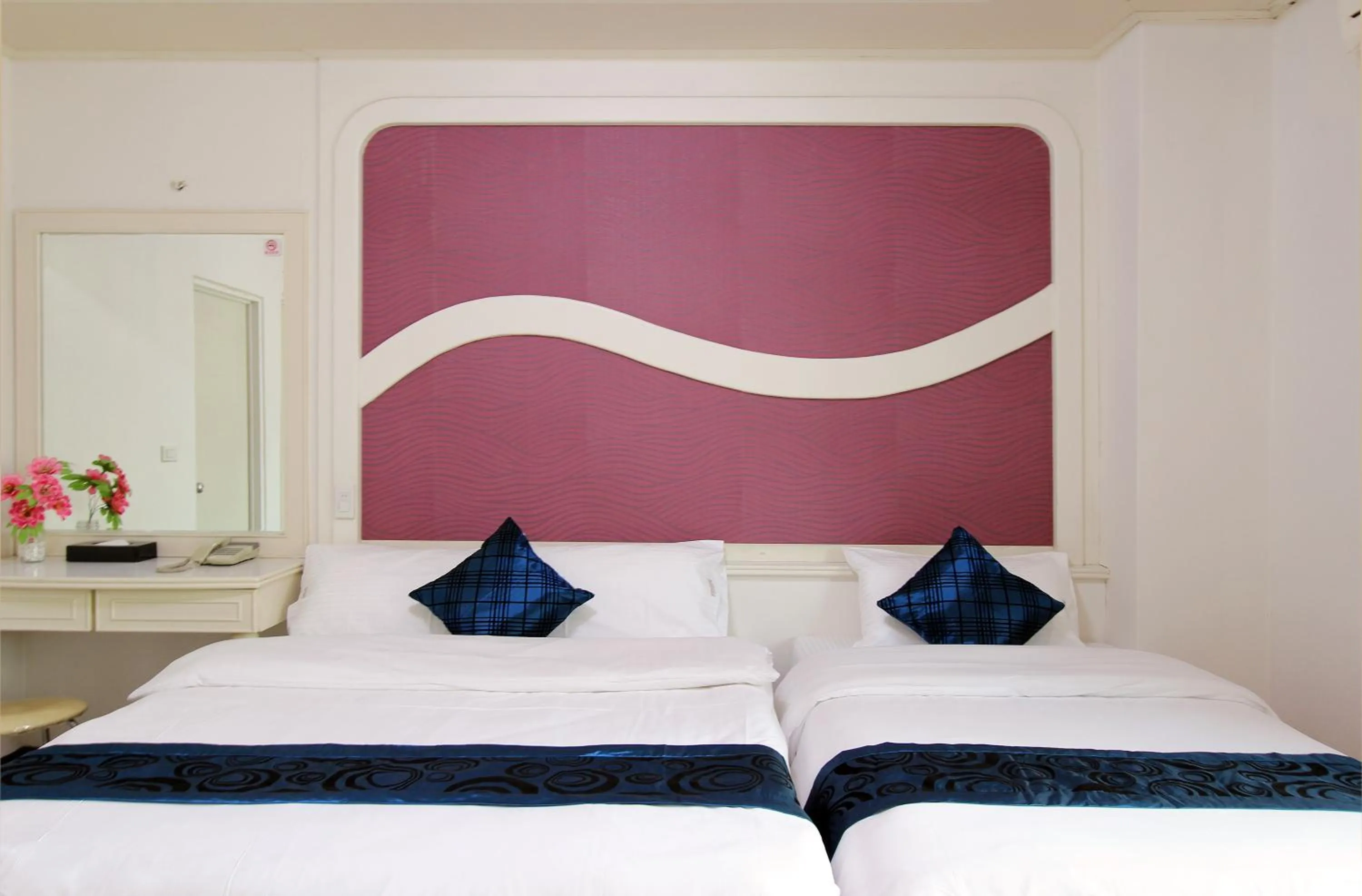 Bedroom, Bed in 陶陶居商旅 Tautauchu Hotel